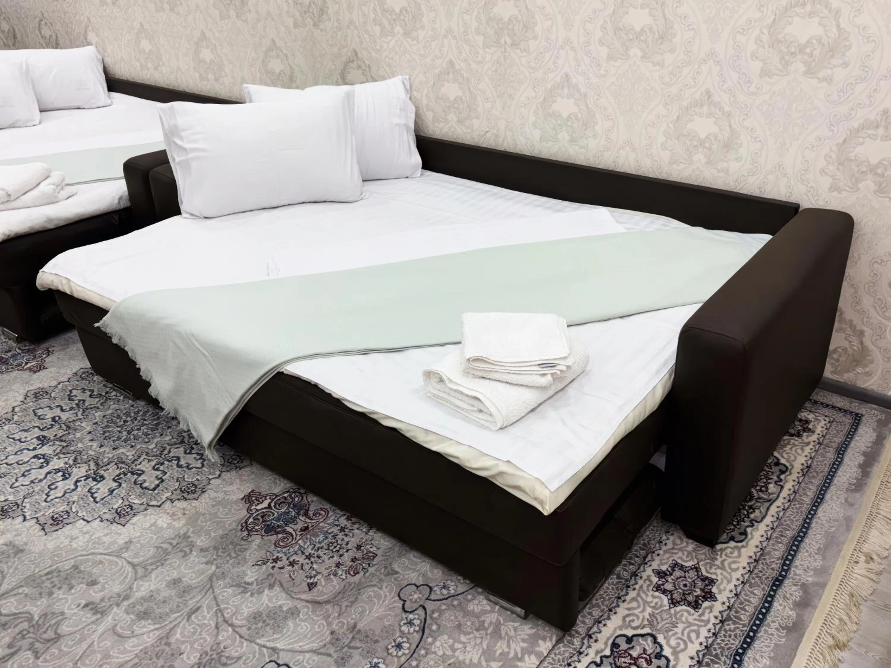 Bed in Fayzli GuestHouse