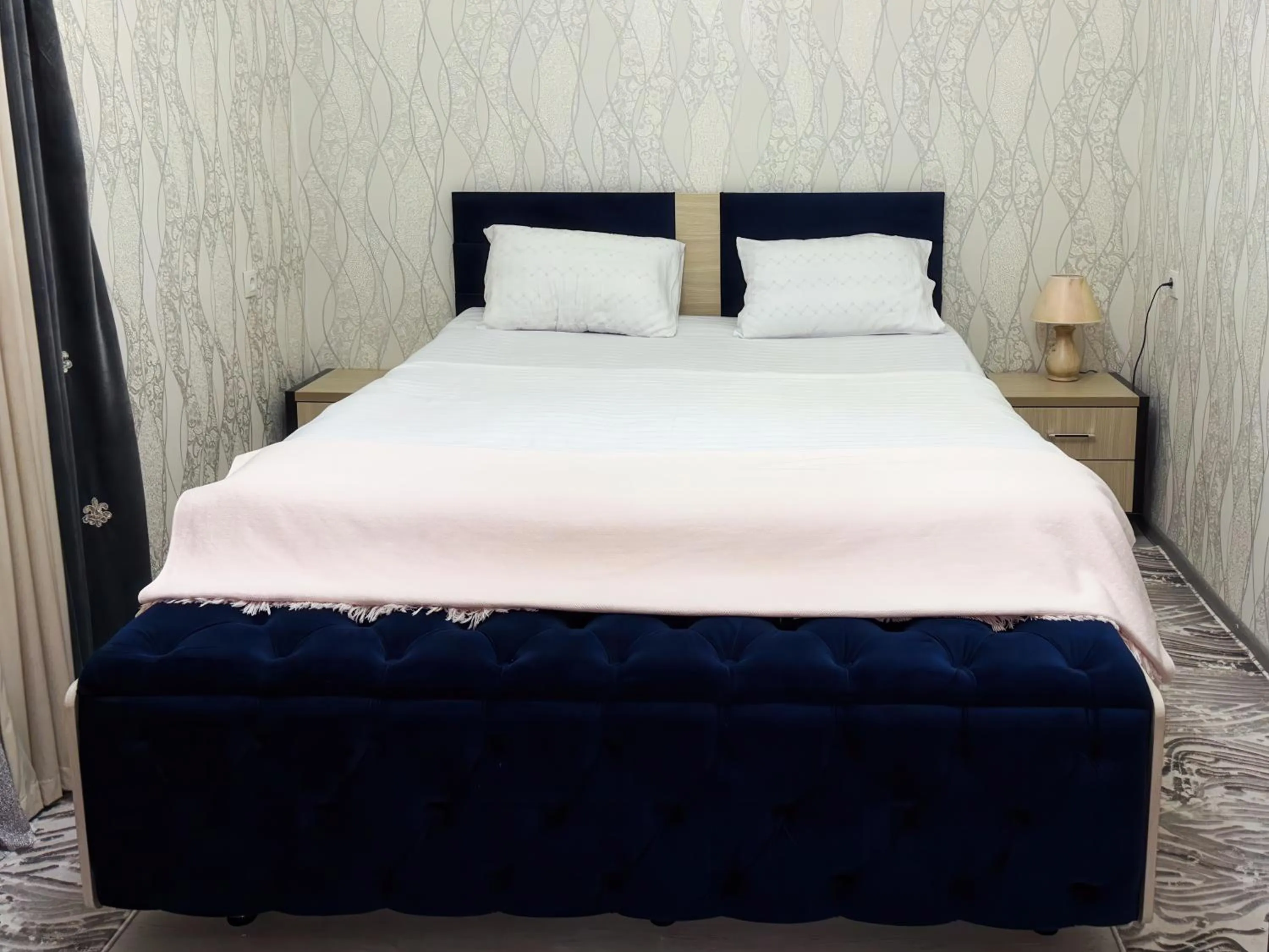 Bed in Fayzli GuestHouse