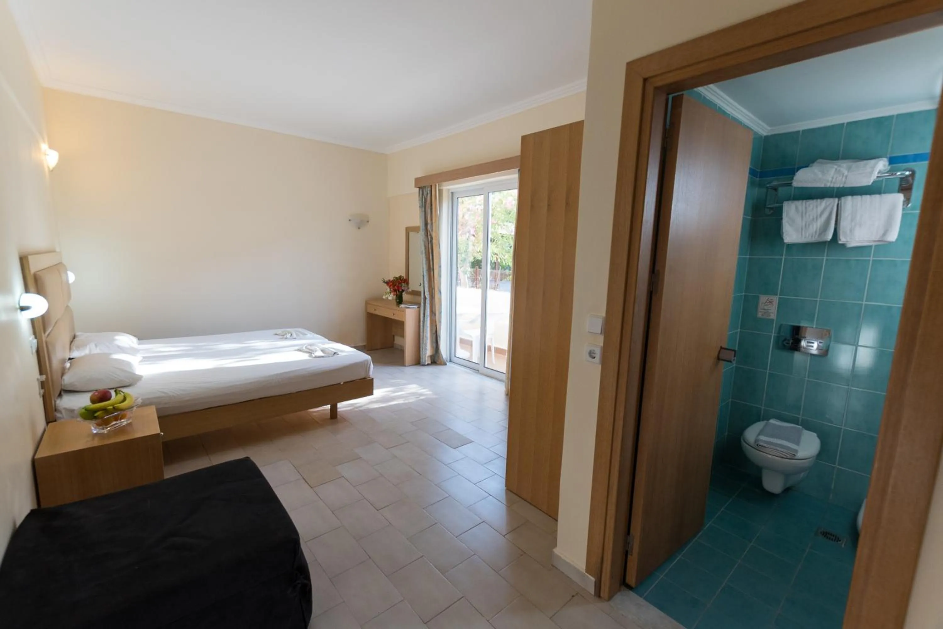 Bed in Amaryllis front beach hotel