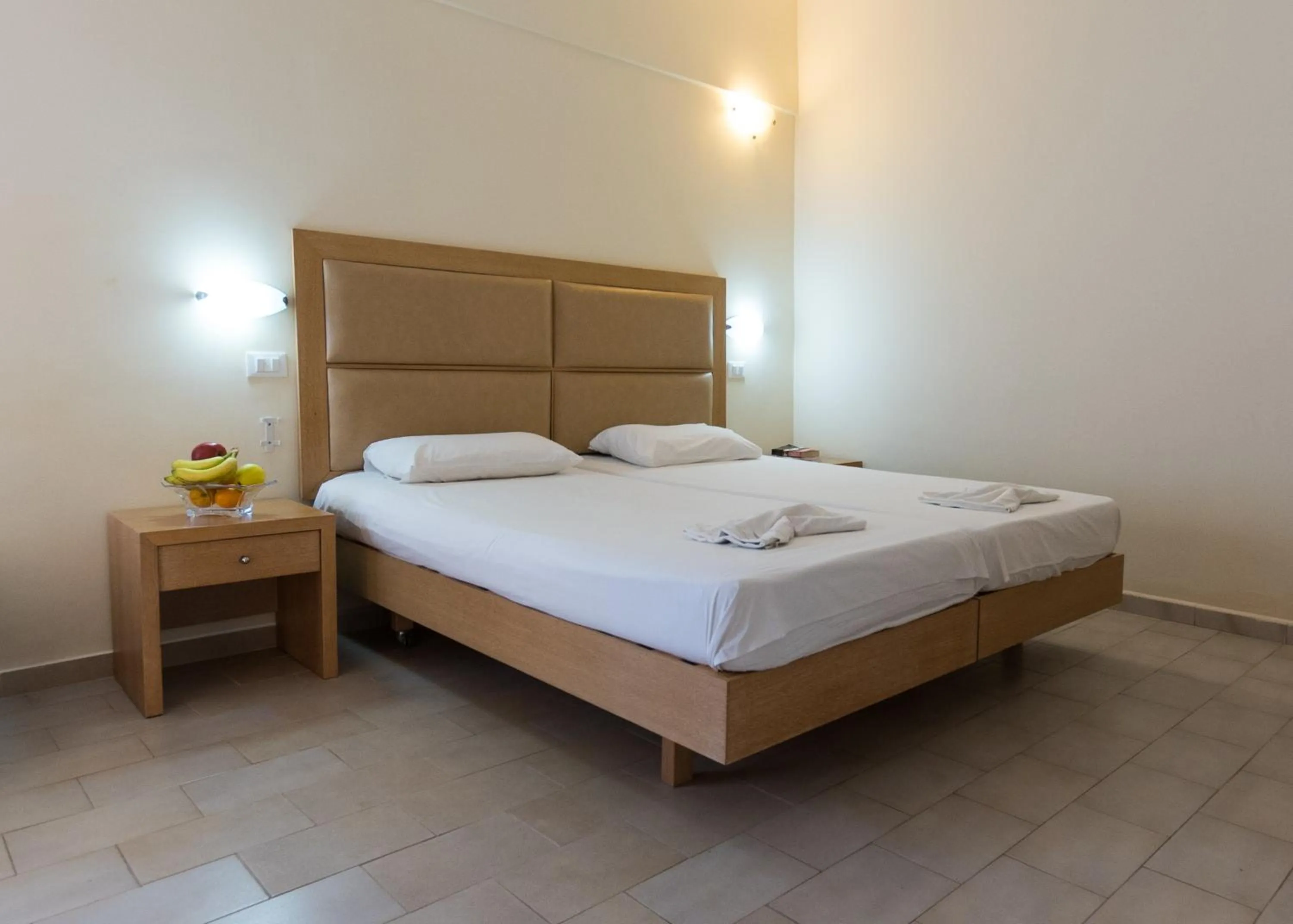 Bed in Amaryllis front beach hotel