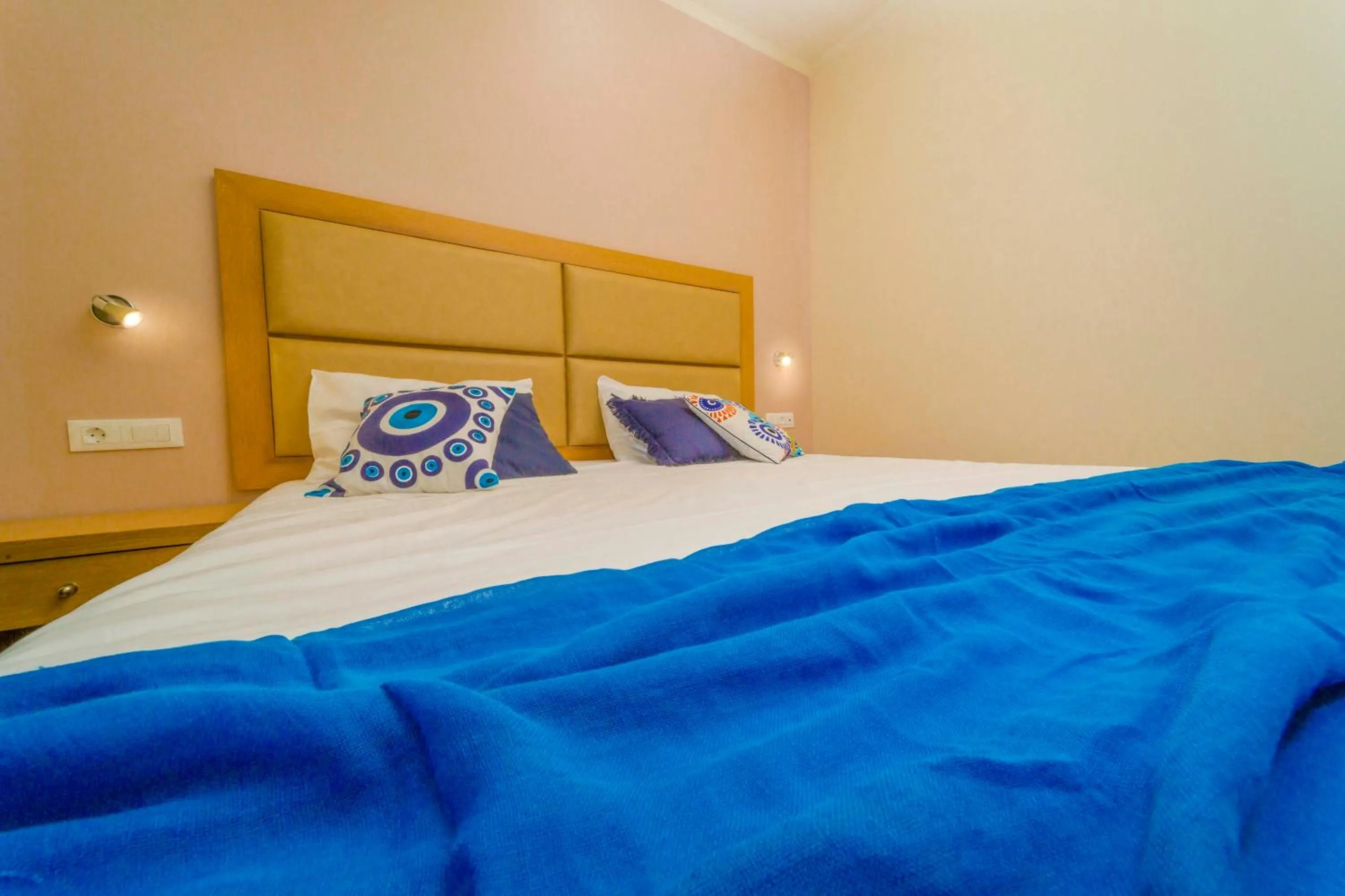 Bed in Amaryllis front beach hotel