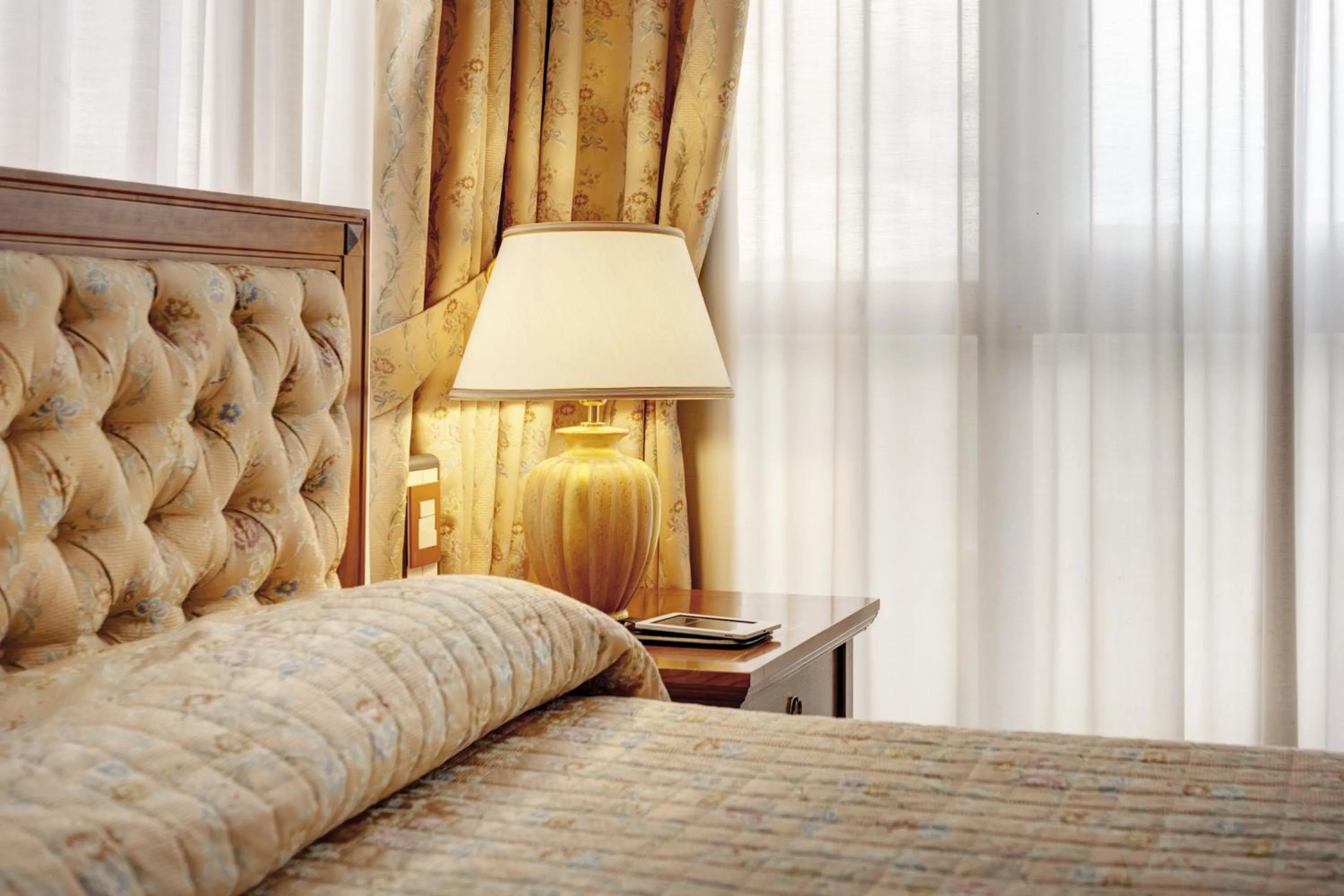 Decorative detail, Bed in Borgo Palace Hotel