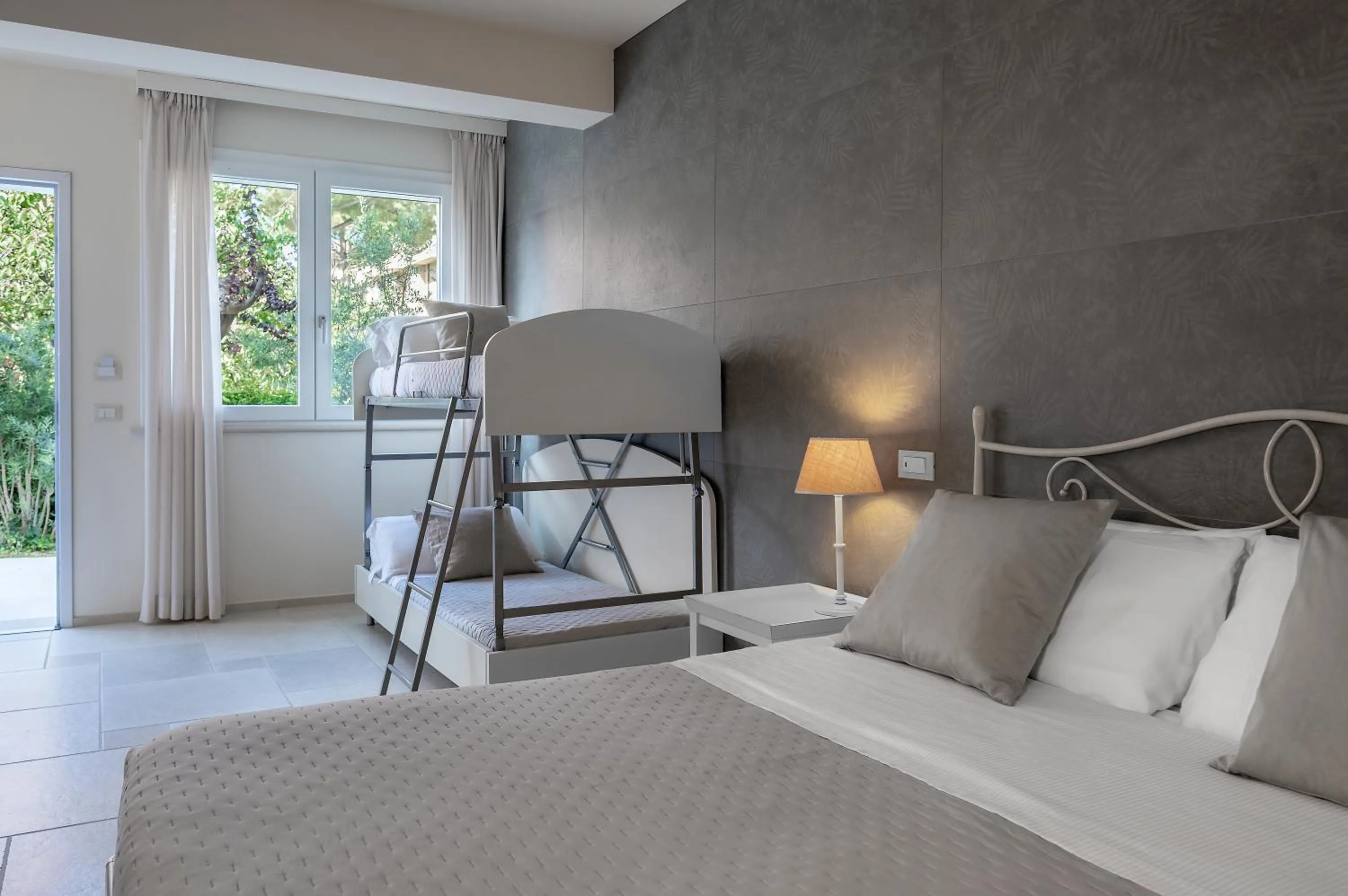 Bed in Hotel Giardino Suites&Spa