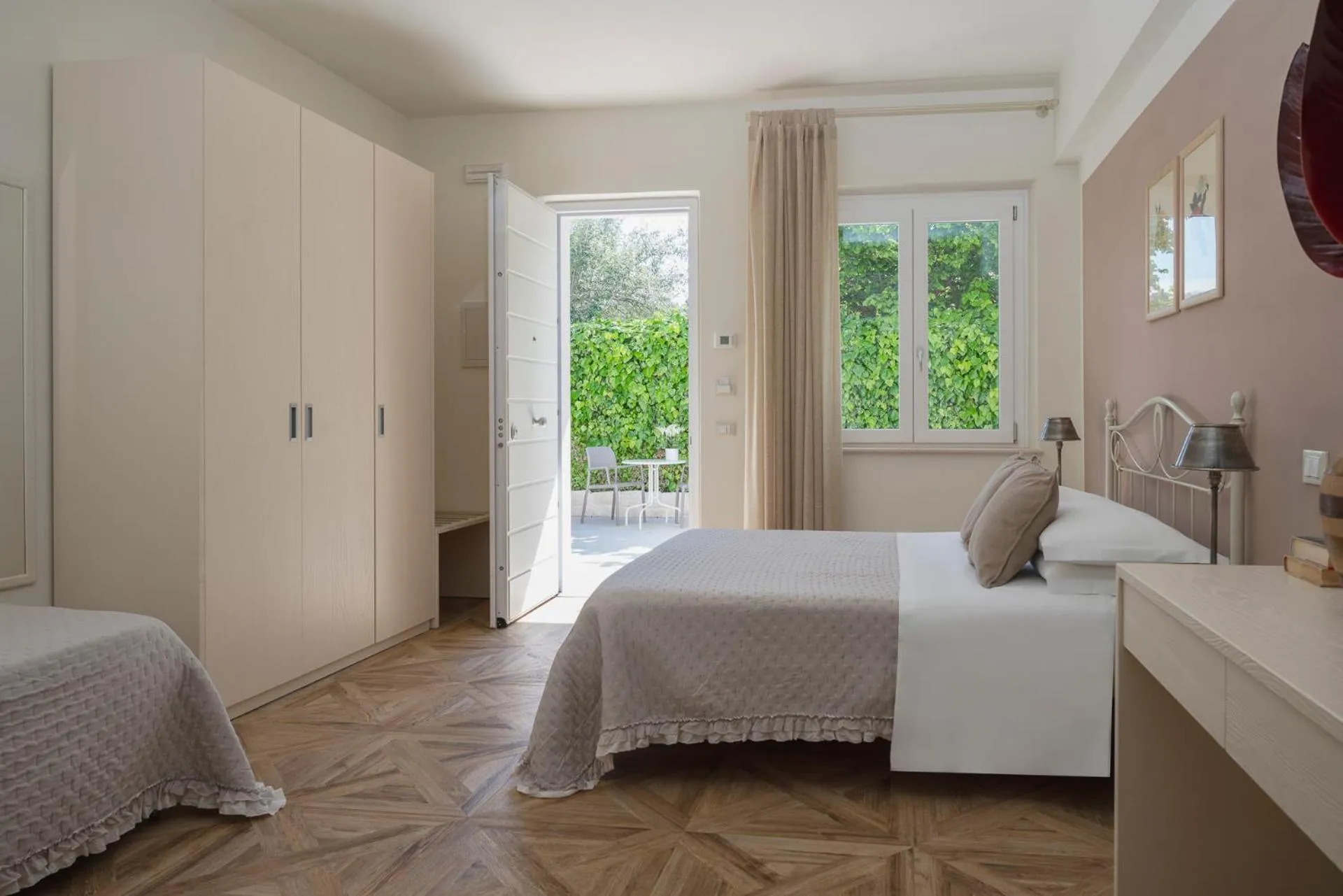 Bed in Hotel Giardino Suites&Spa