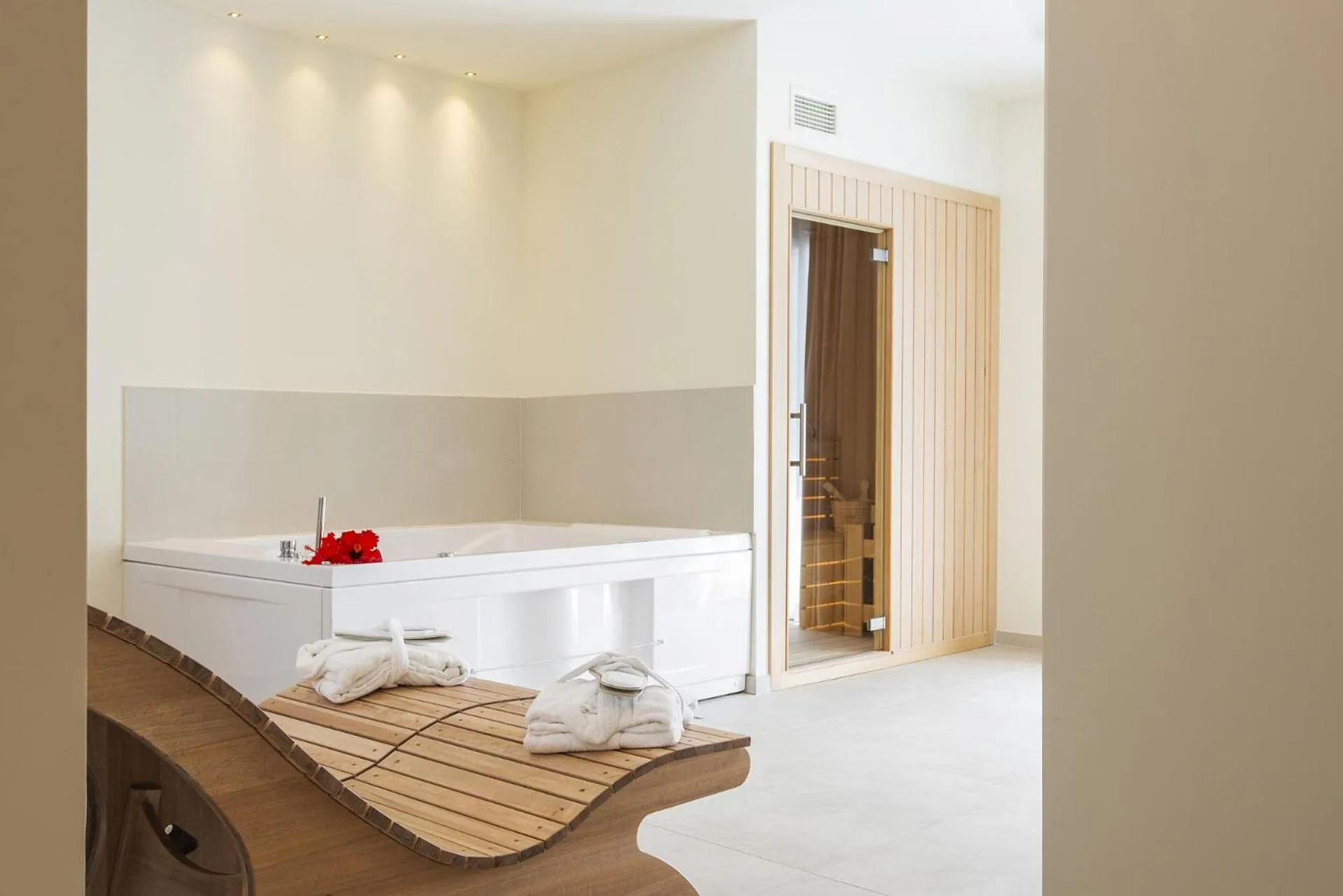 Bed in Hotel Giardino Suites&Spa