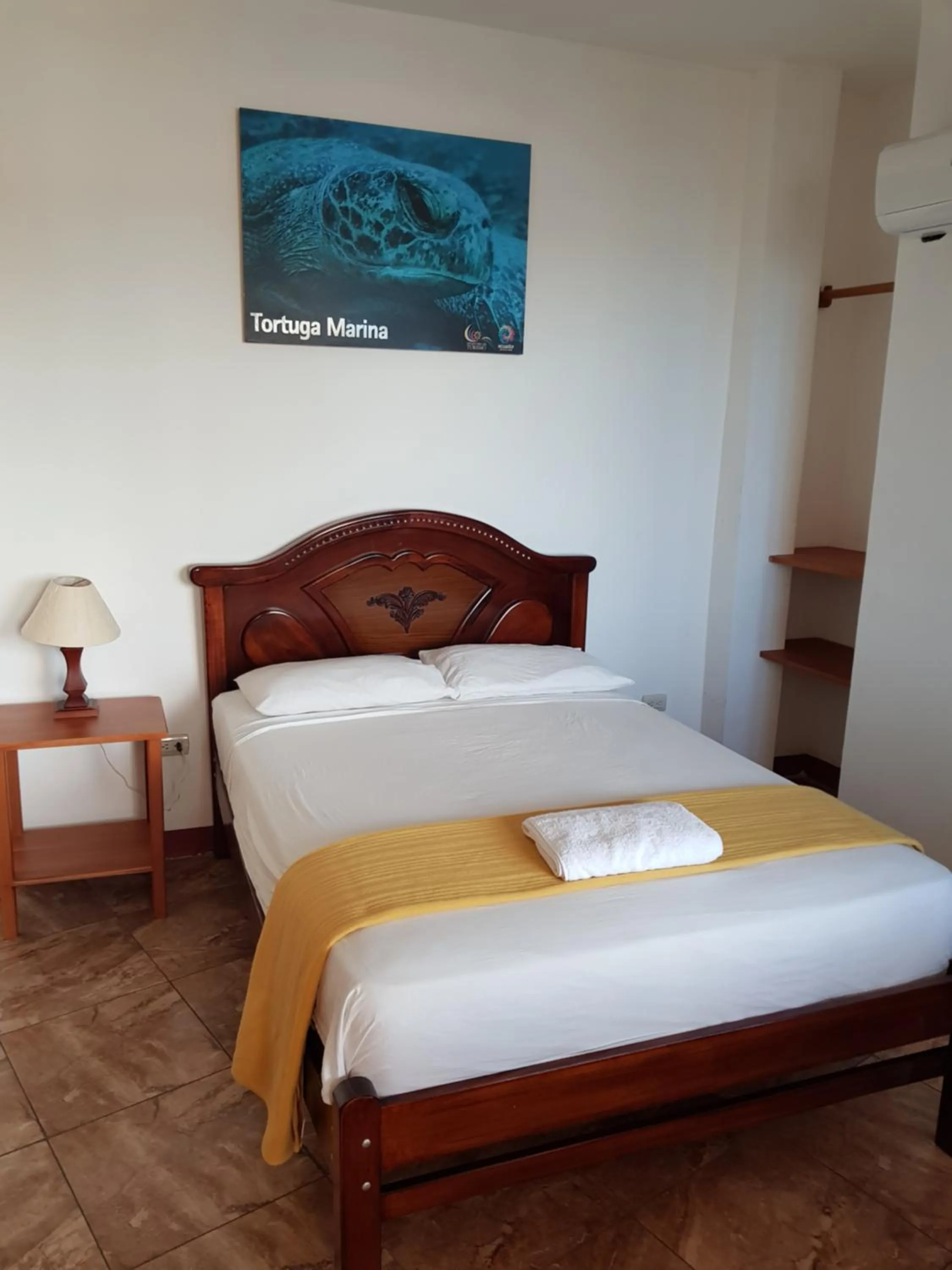 Bed in Gloria - Galápagos Inn