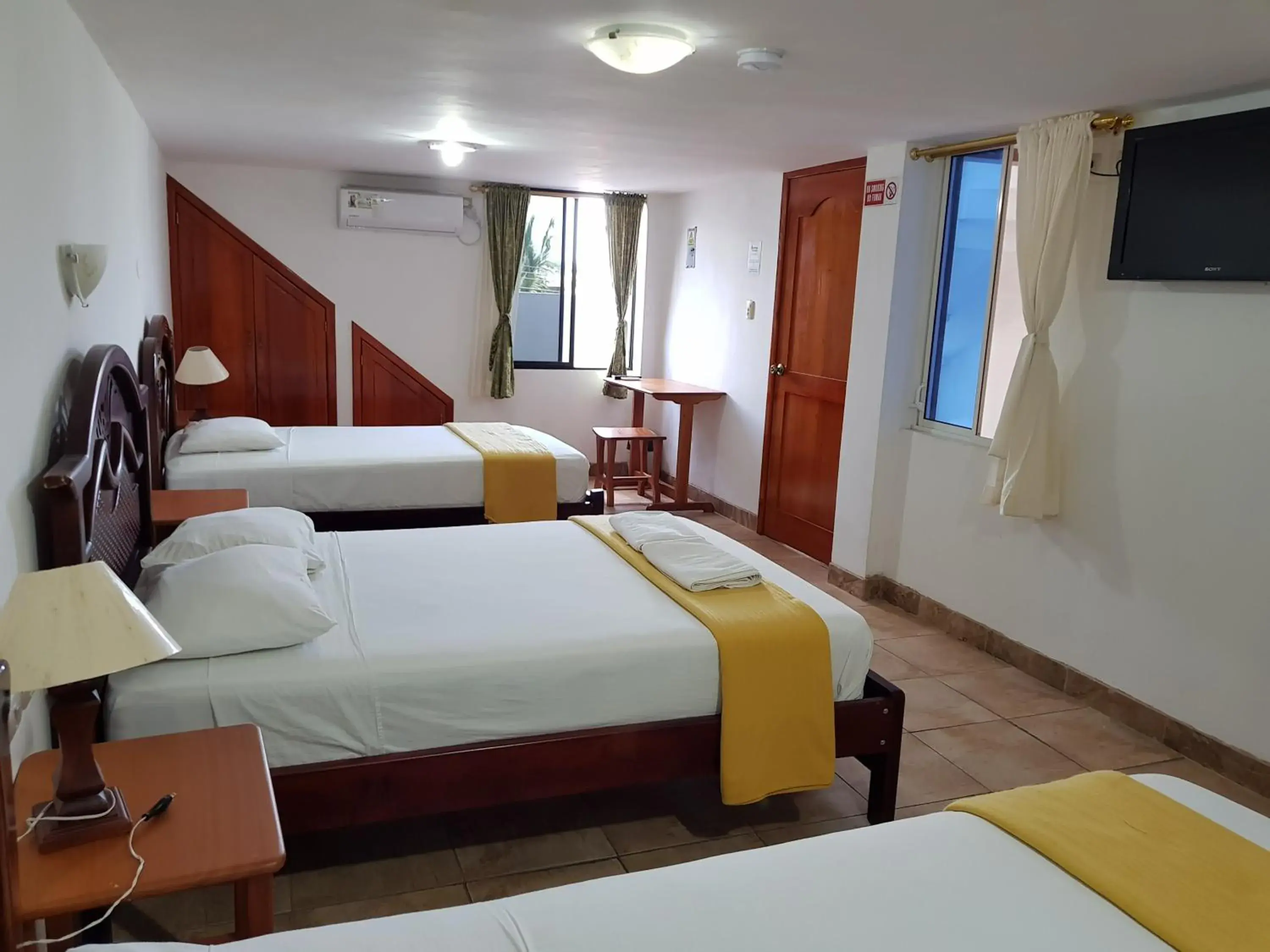 Triple Room in Gloria - Galápagos Inn Triple Room in Gloria - Galápagos Inn