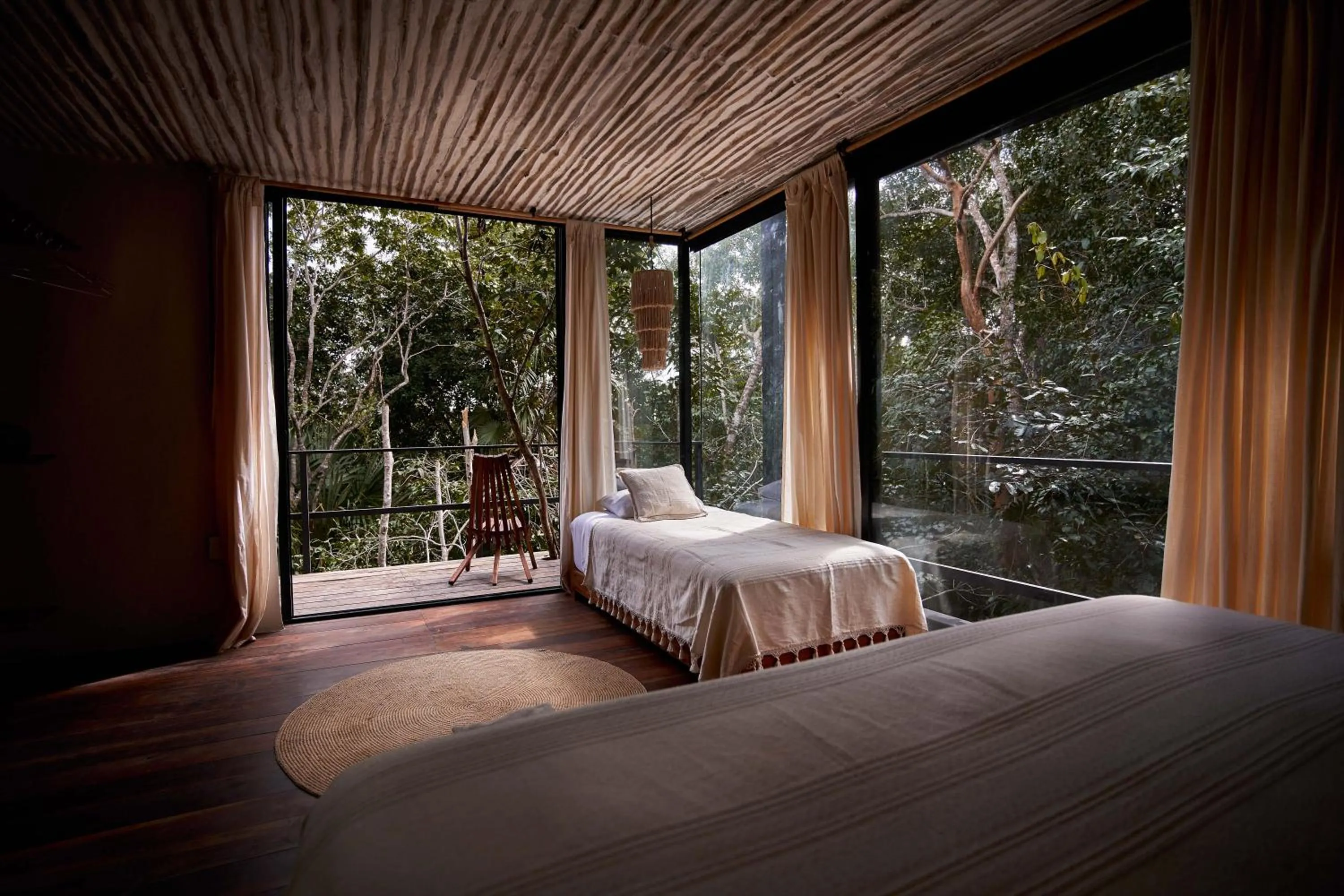 Bedroom in Kapok Bacalar - Plant Based Hotel