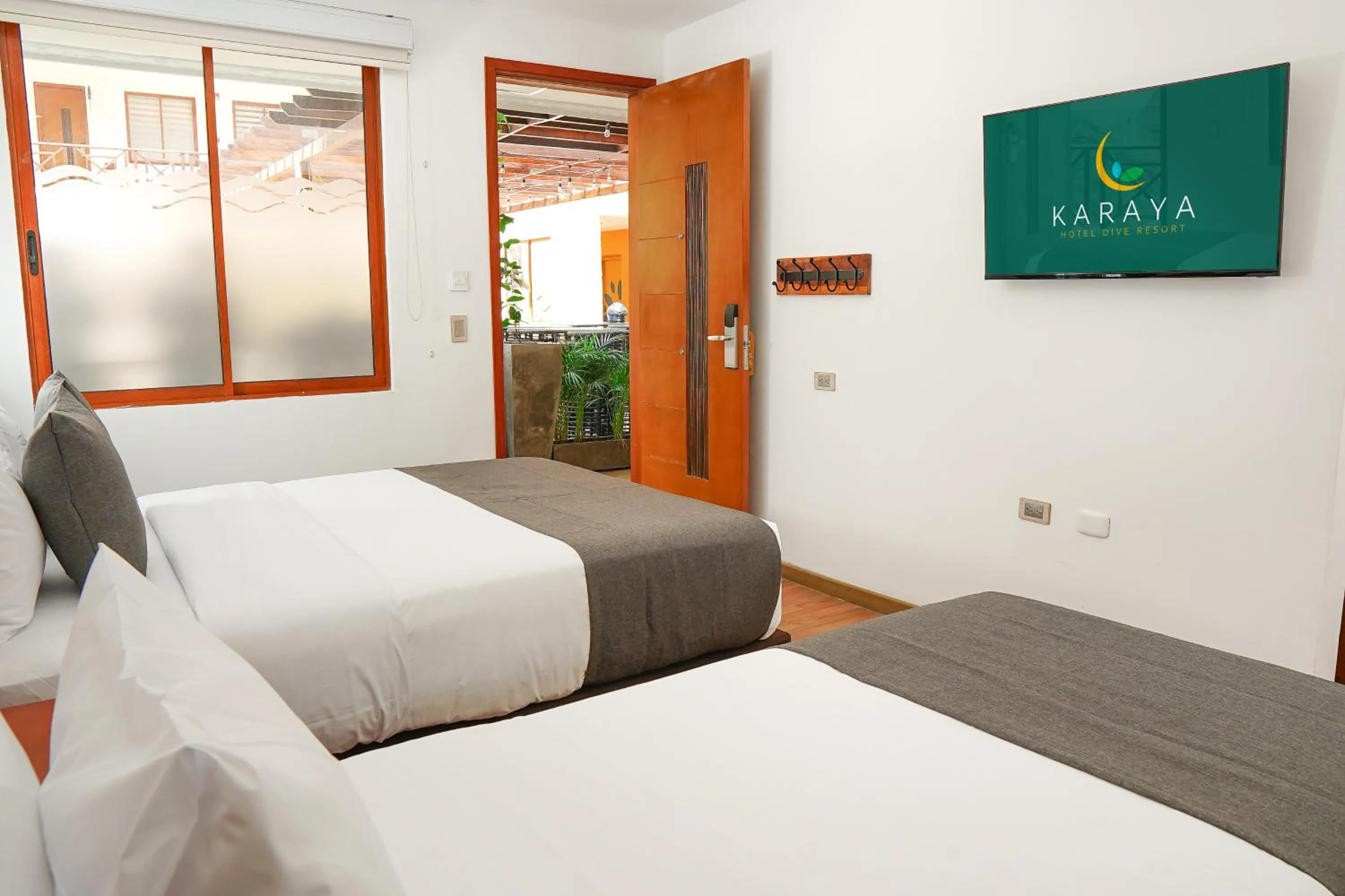 Photo of the whole room, Bed in HOTEL KARAYA DIVE RESORT