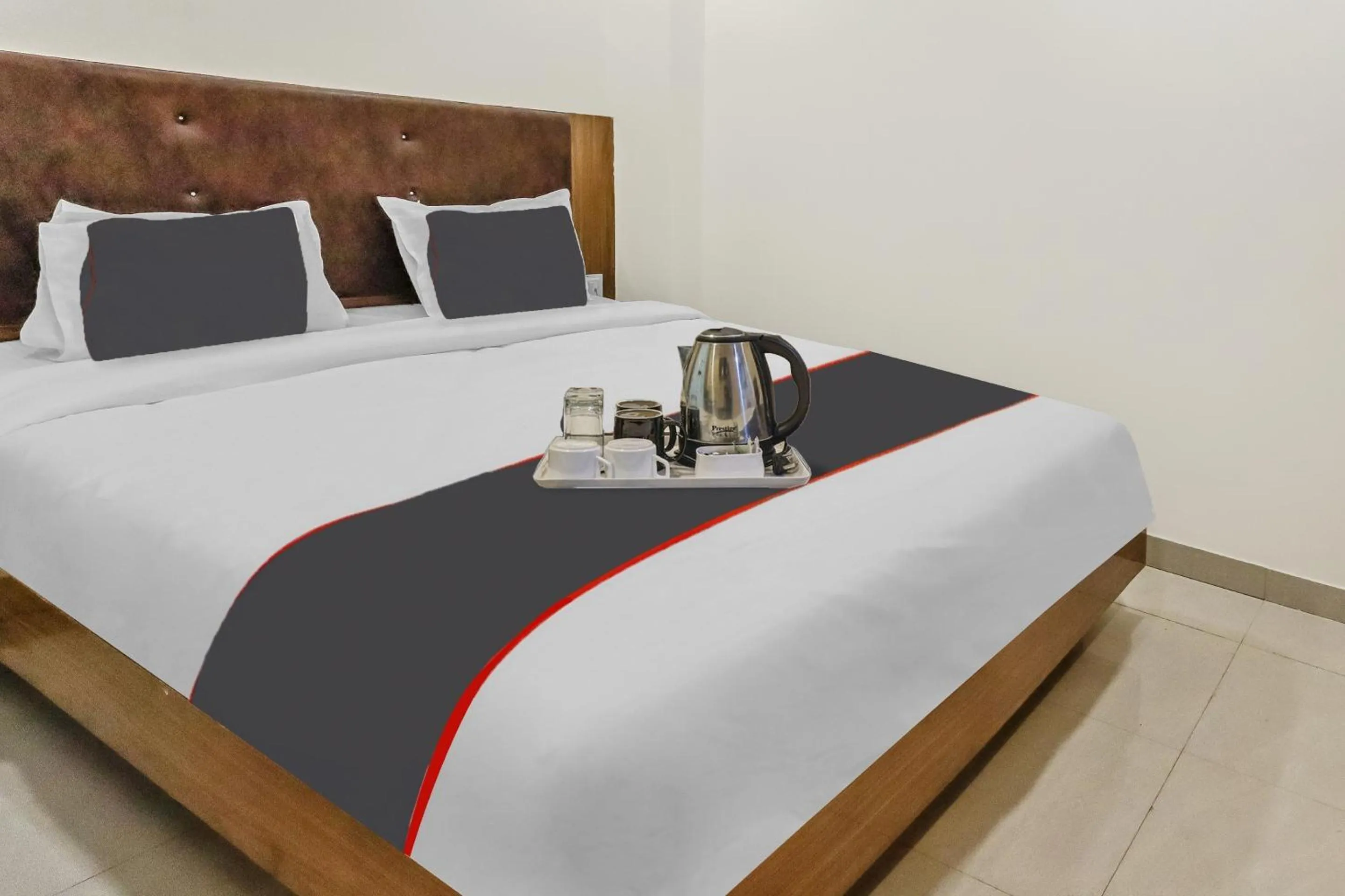 Bedroom in Capital O Silkroute Palaace