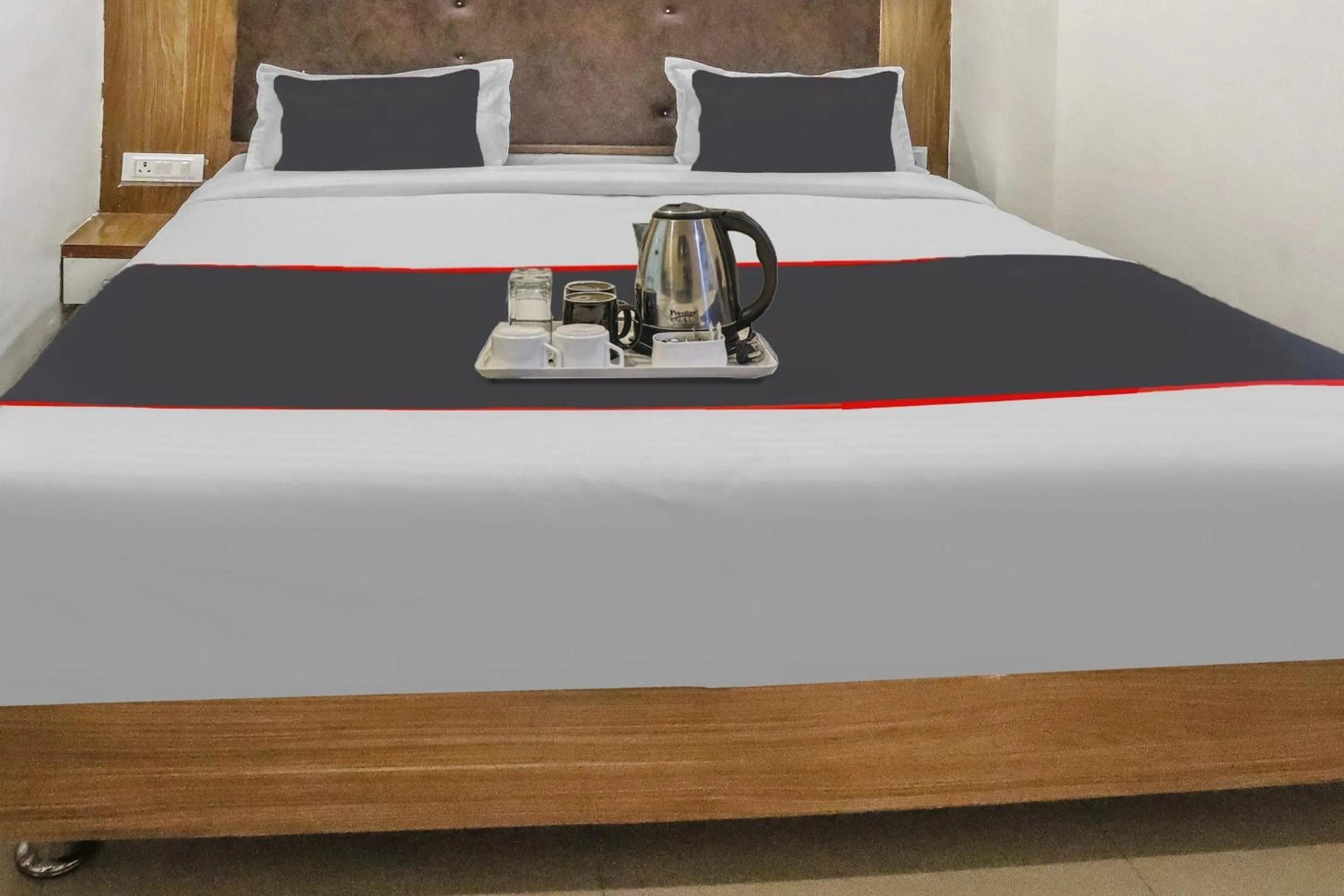 Bedroom in Capital O Silkroute Palaace