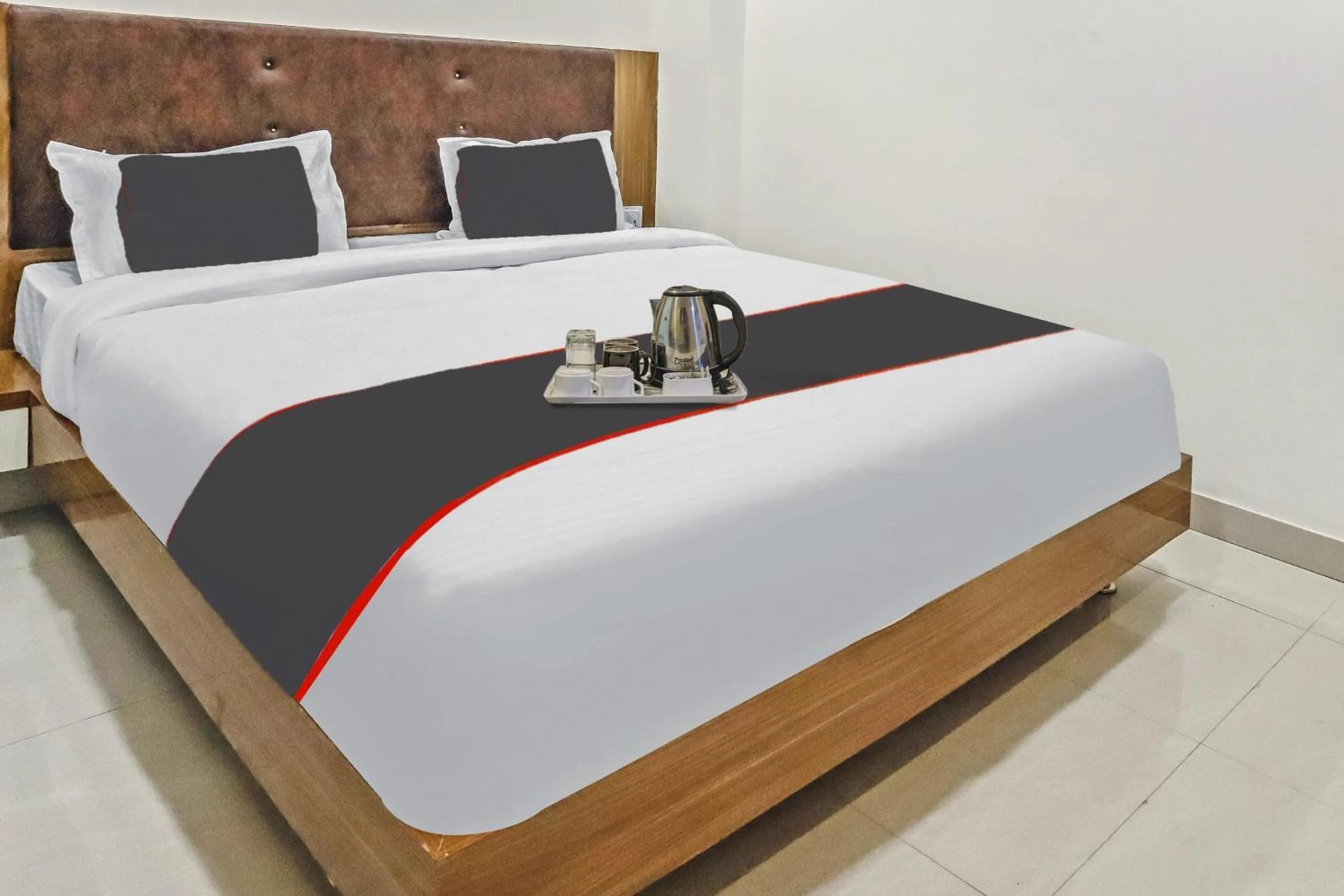 Bedroom in Capital O Silkroute Palaace