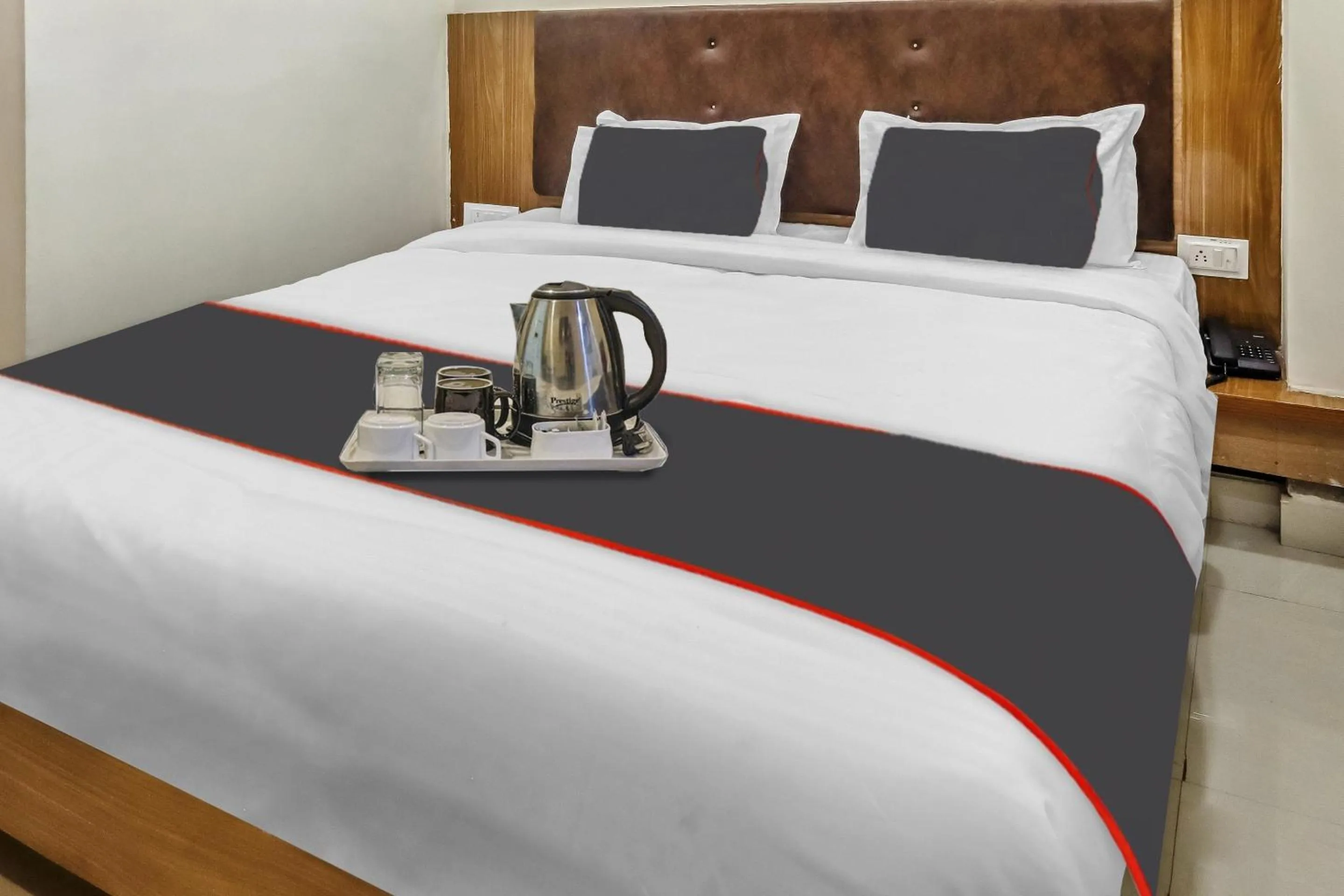 Bedroom in Capital O Silkroute Palaace