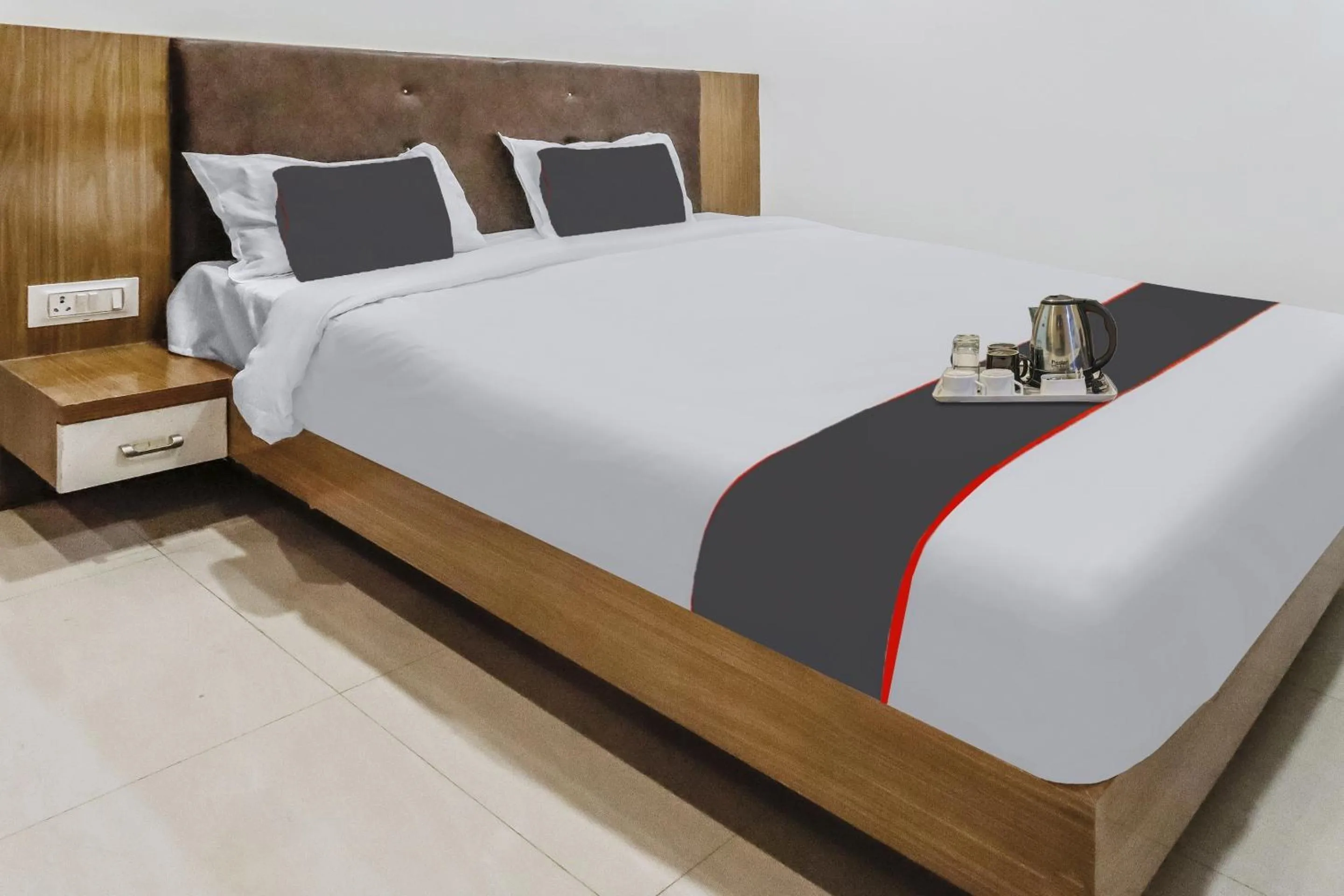 Bedroom in Capital O Silkroute Palaace