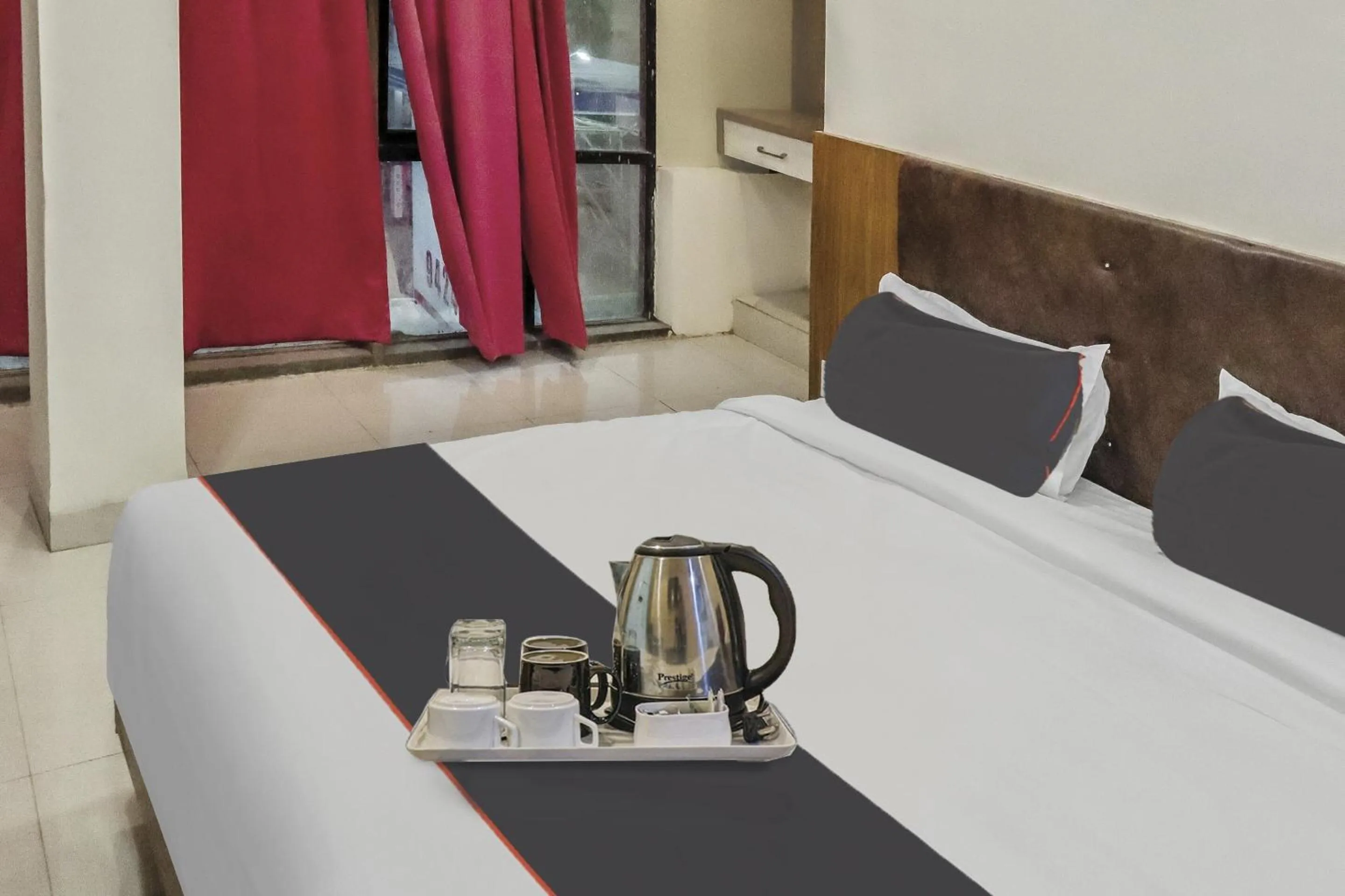 Bedroom in Capital O Silkroute Palaace