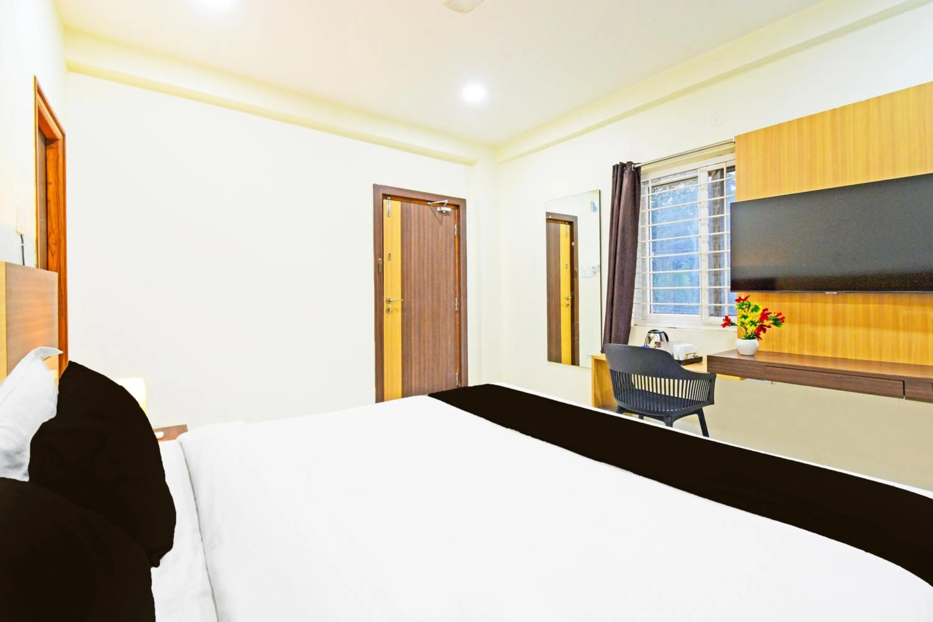 Bedroom, Bed in Super Townhouse Kondapur Near Botanical Garden Formerly RRR Inn