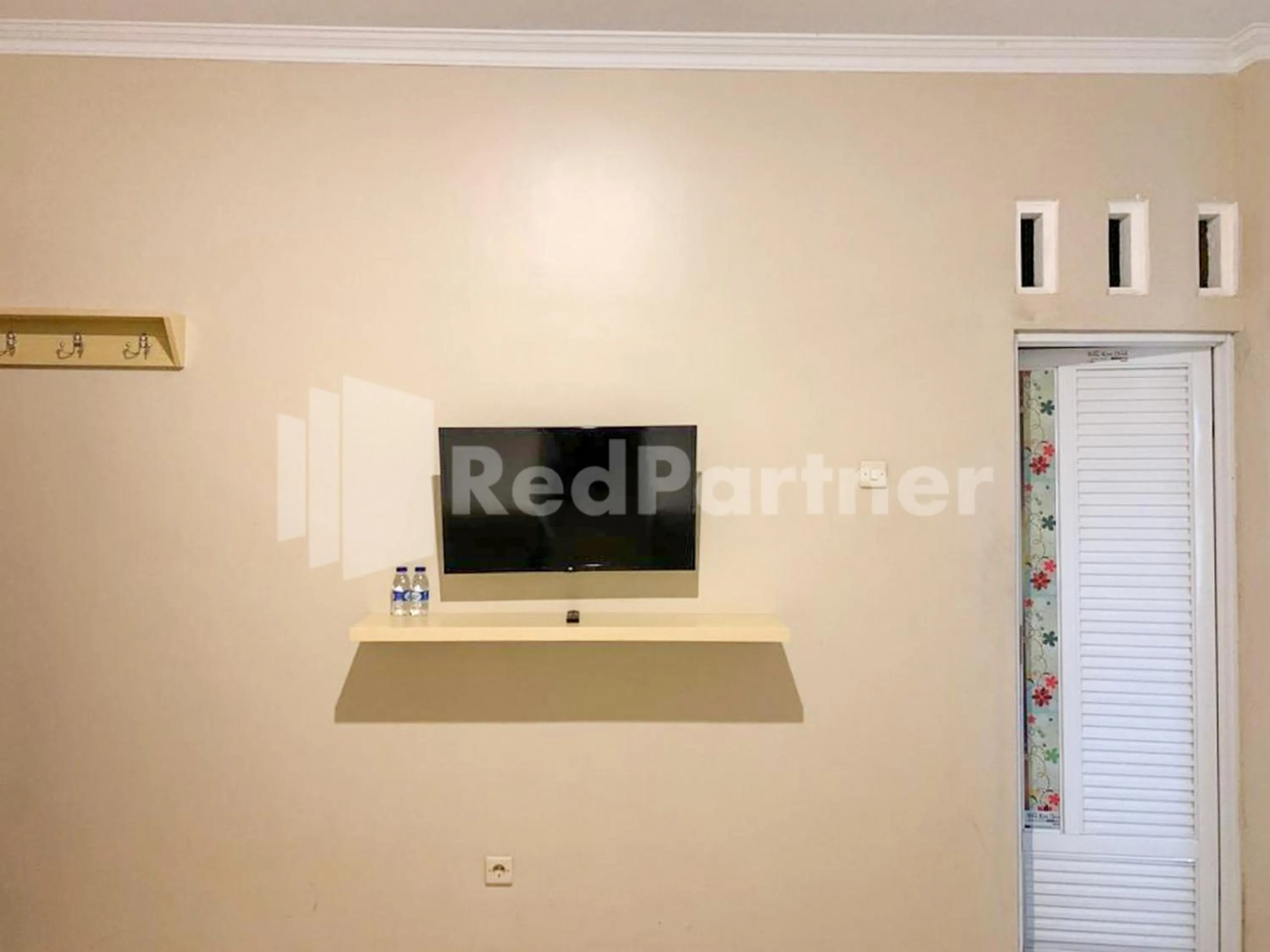 Bedroom in Hotel Andono near YIA Mitra RedDoorz