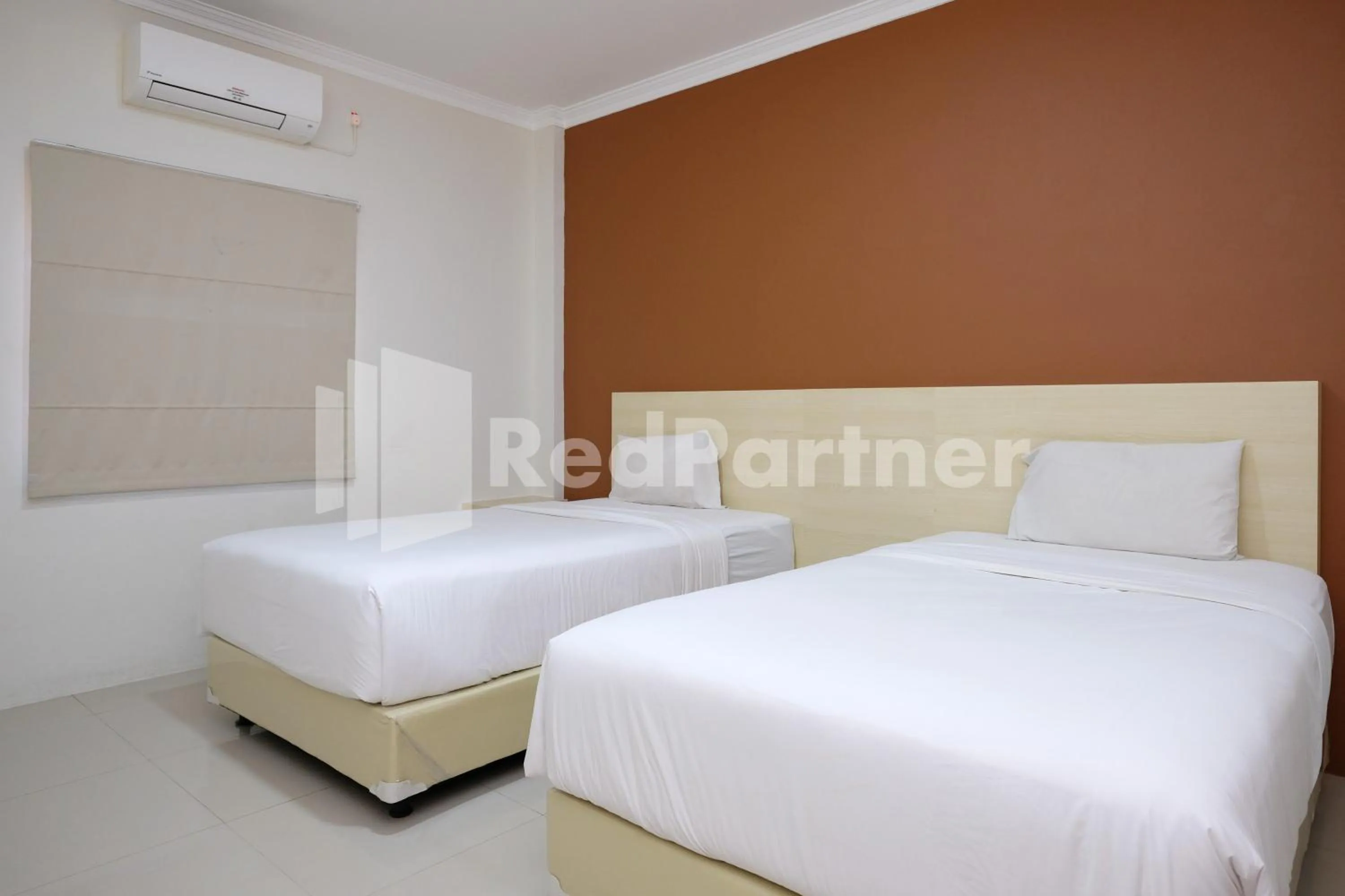 Bedroom, Bed in Hotel Andono near YIA Mitra RedDoorz