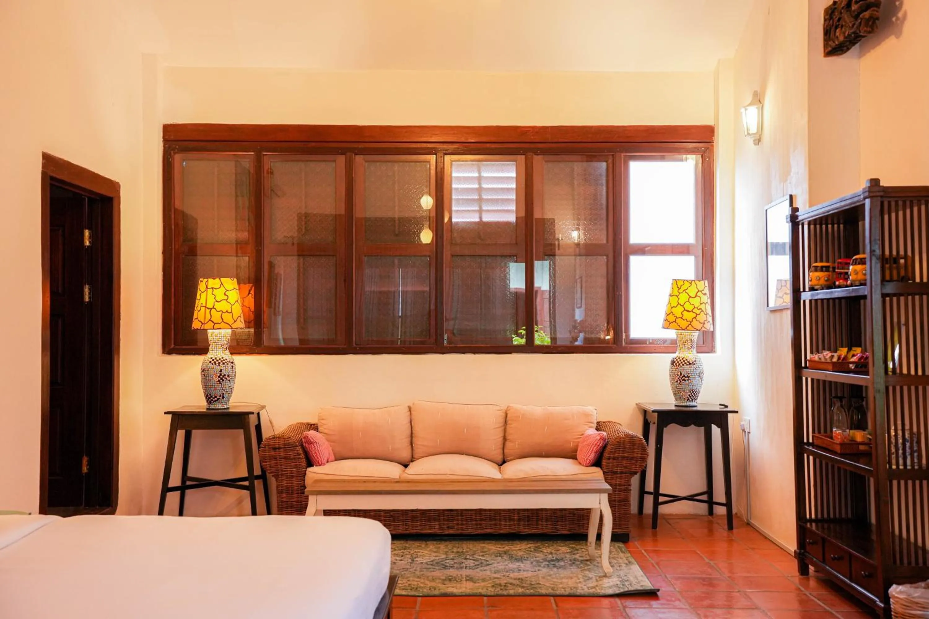 Seating area, Bed in East Indies Mansion