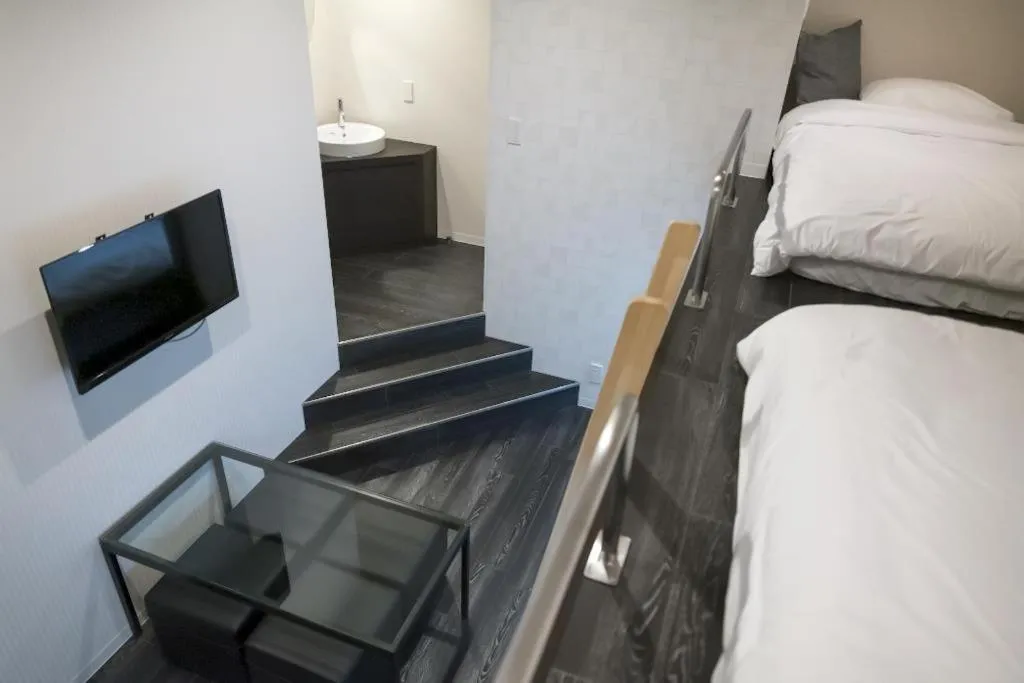 Photo of the whole room, Bed in GRAND CAVE MOTOMACHI