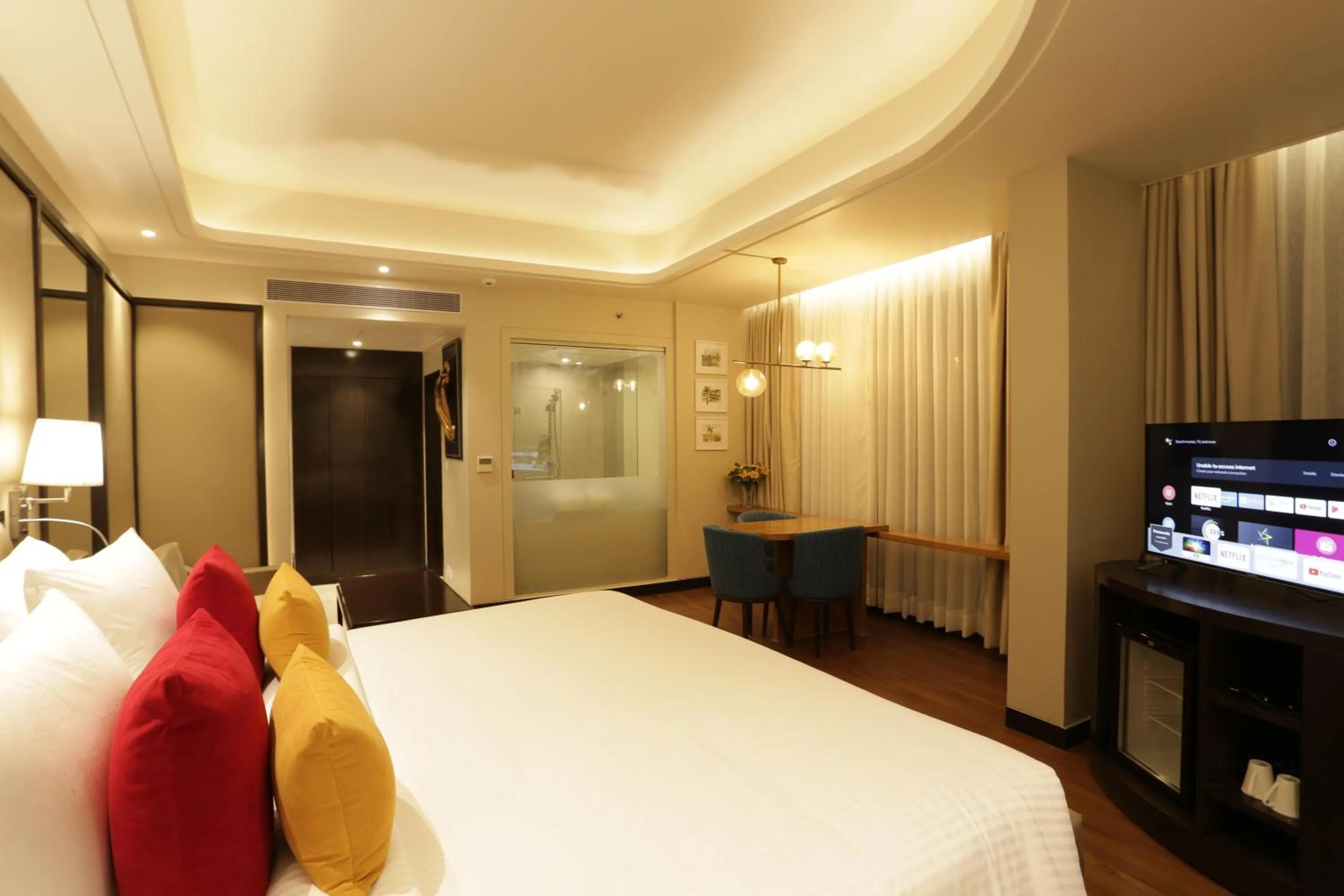 Photo of the whole room, Bed in The Vaishnodevi Sarovar Portico