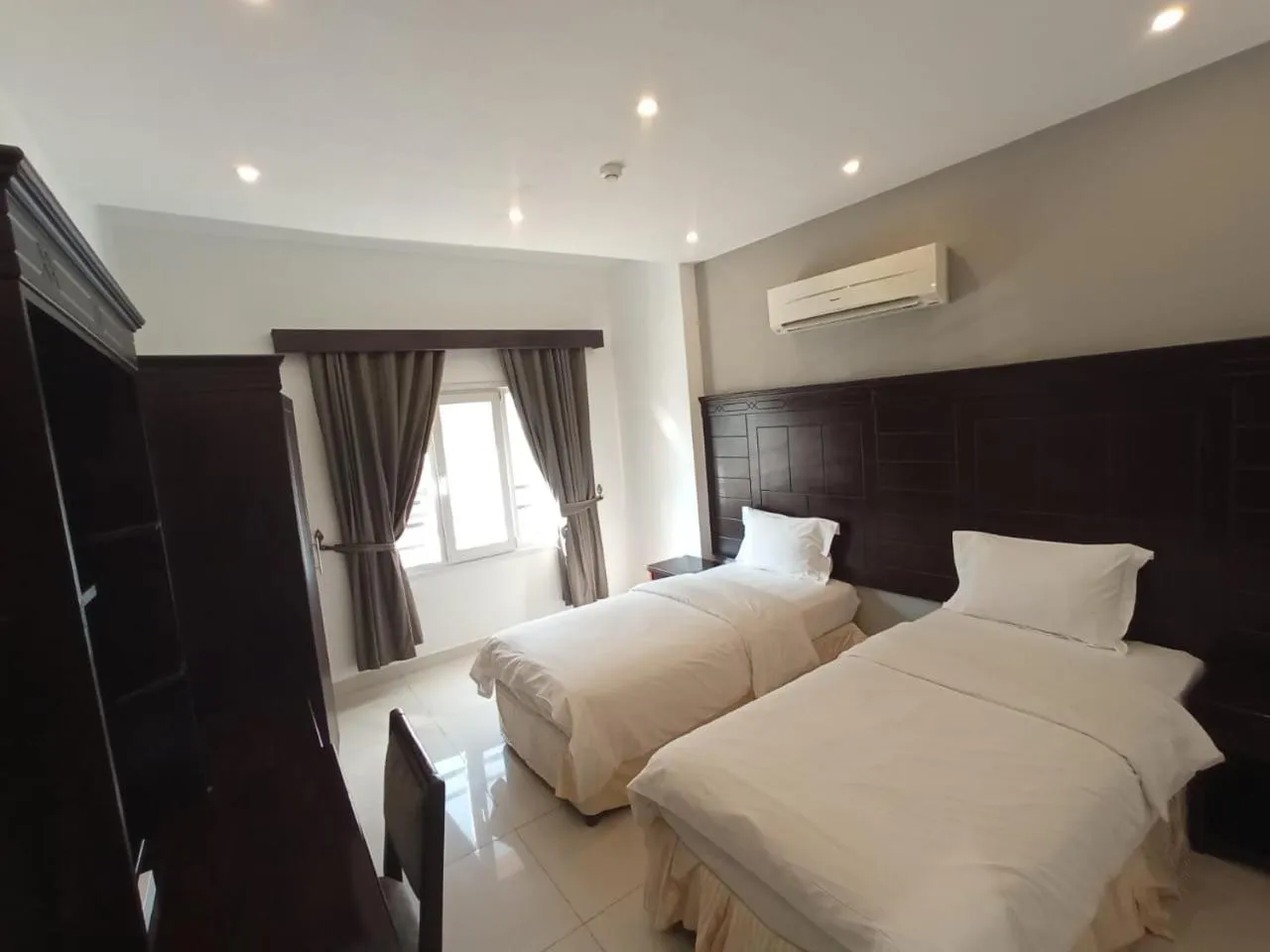 Bed in Asfar Hotel Apartments