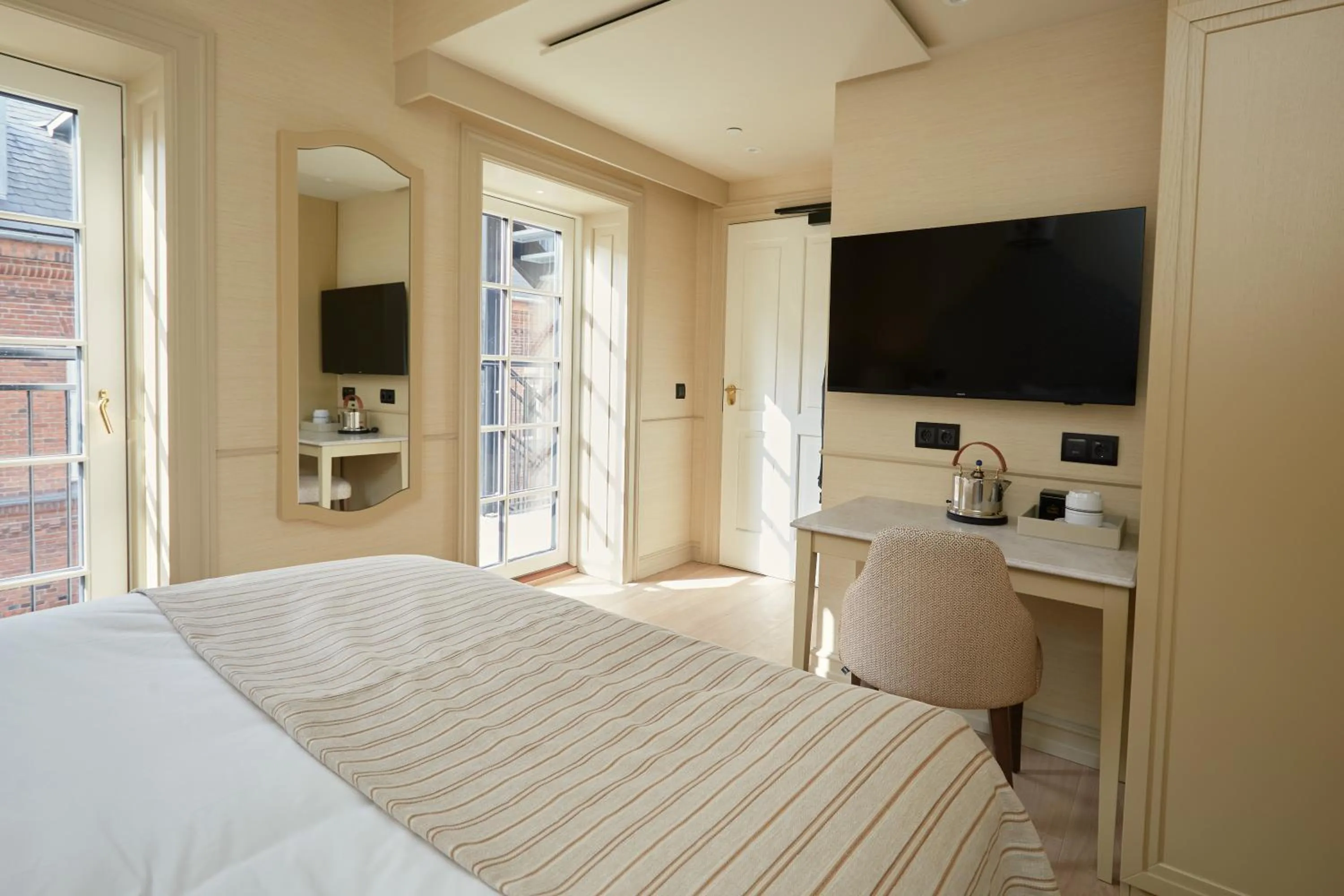 Bed in Henriks Hotel