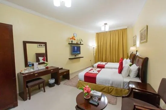 Bed in Crown Palace Hotel