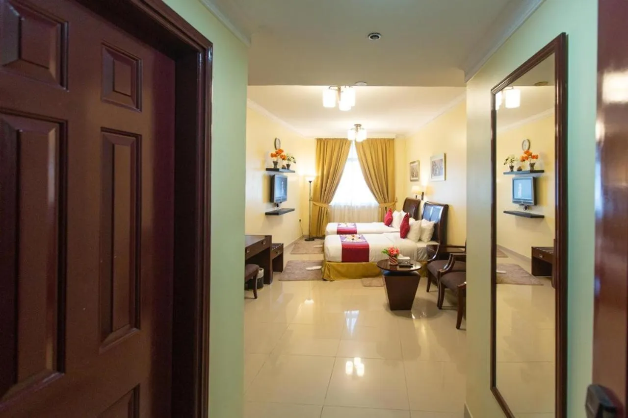 Bed in Crown Palace Hotel