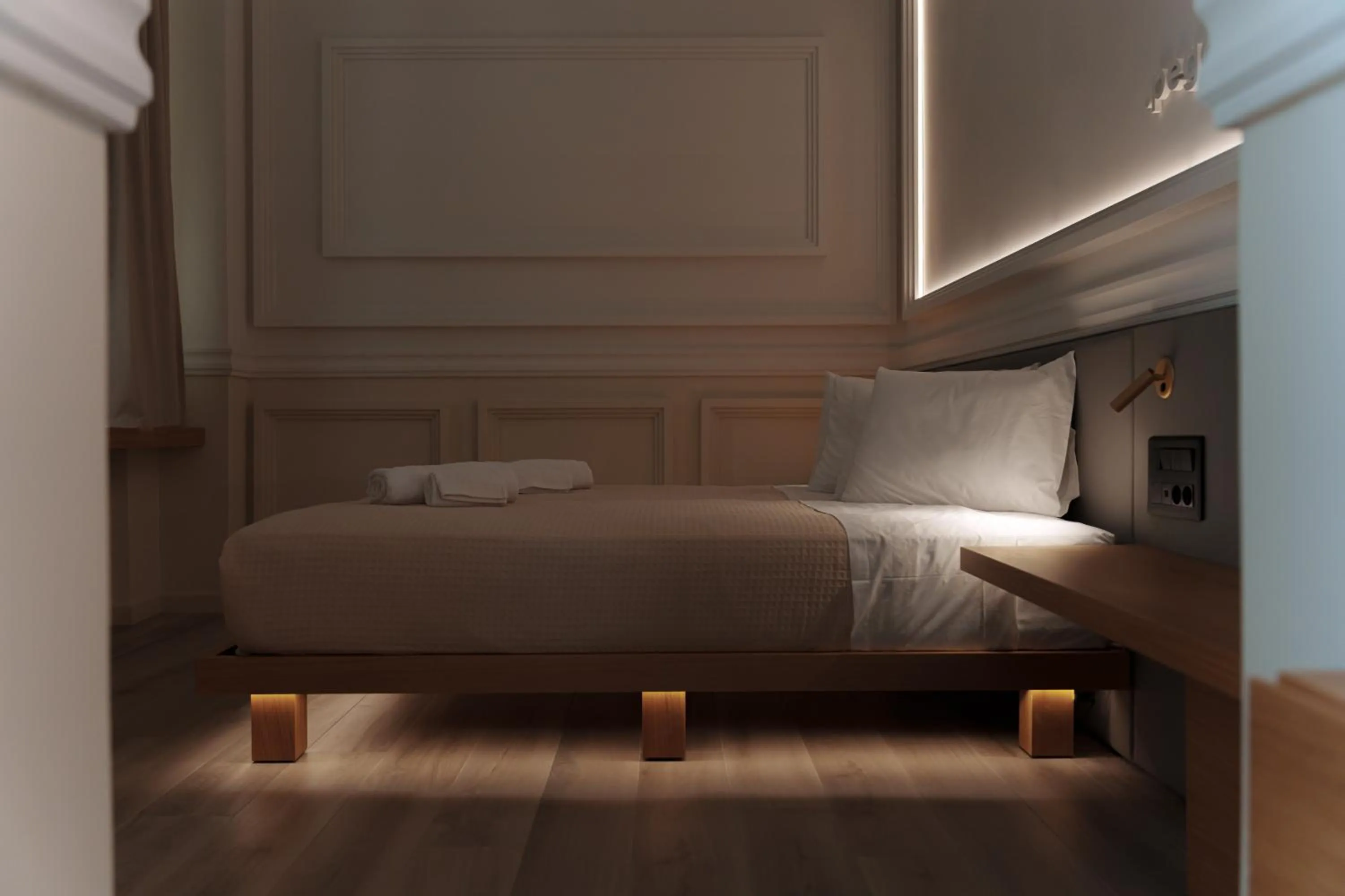 Bed in Agora Athens Suites