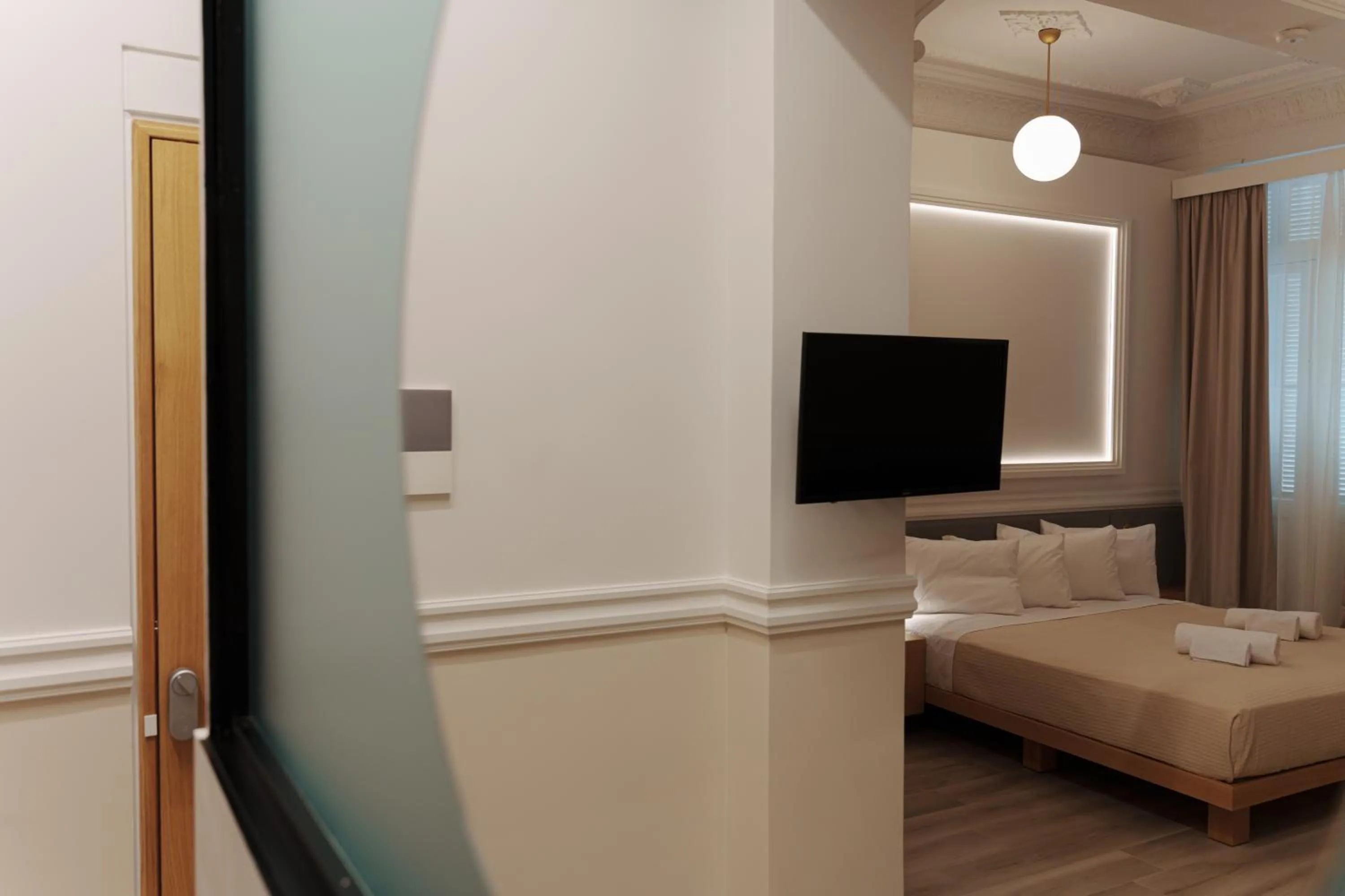 Photo of the whole room, Bed in Agora Athens Suites