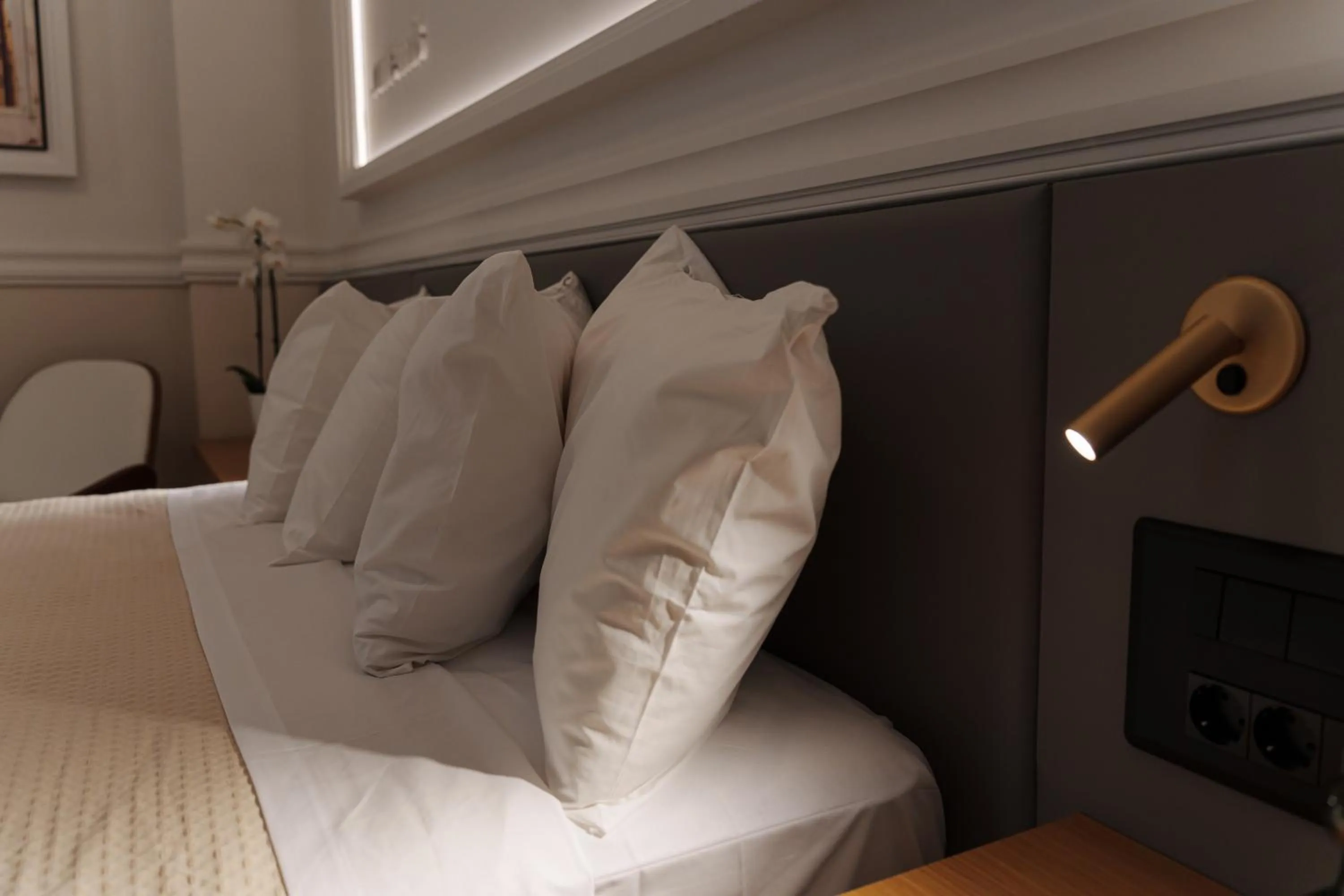 Bed in Agora Athens Suites