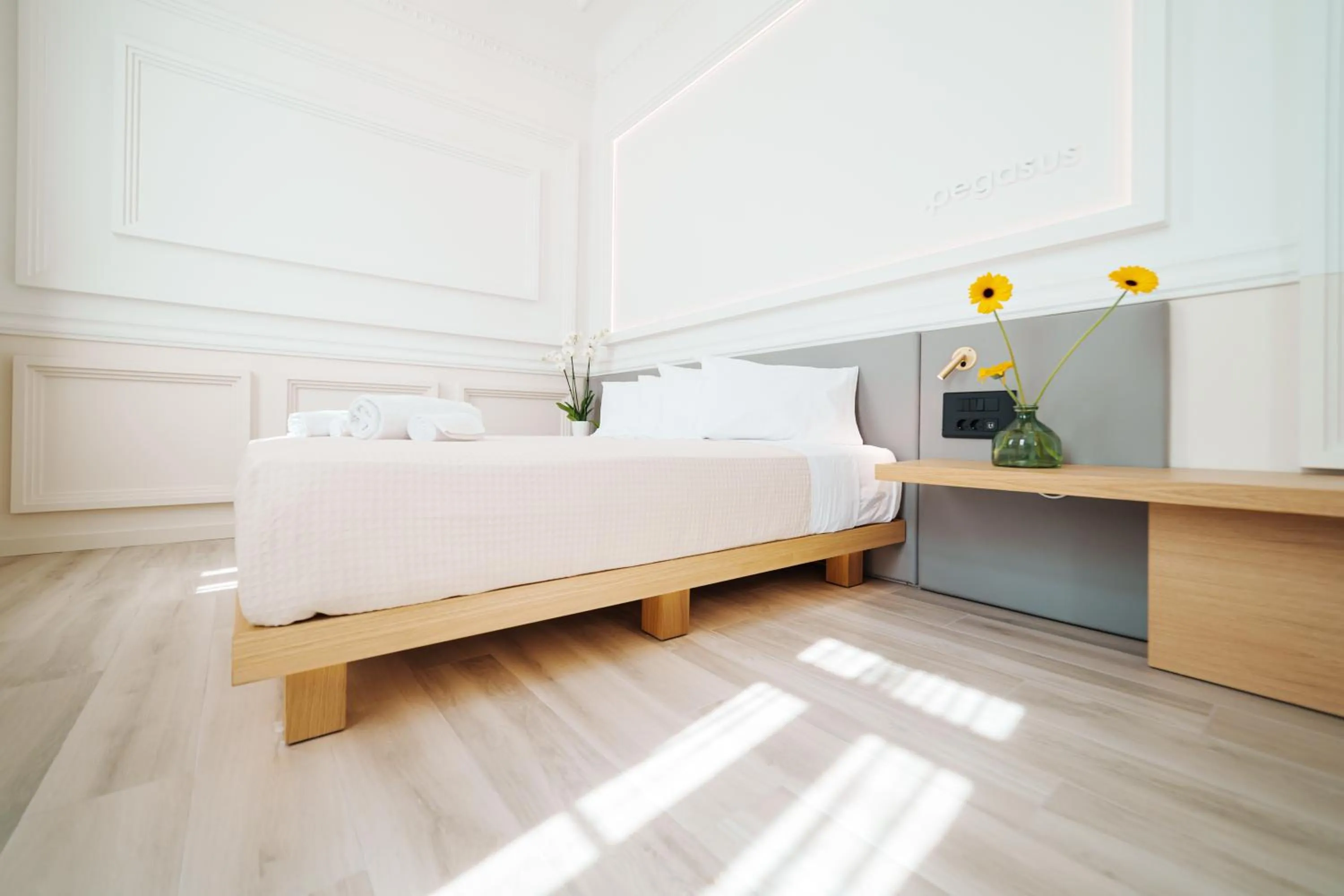Bed in Agora Athens Suites