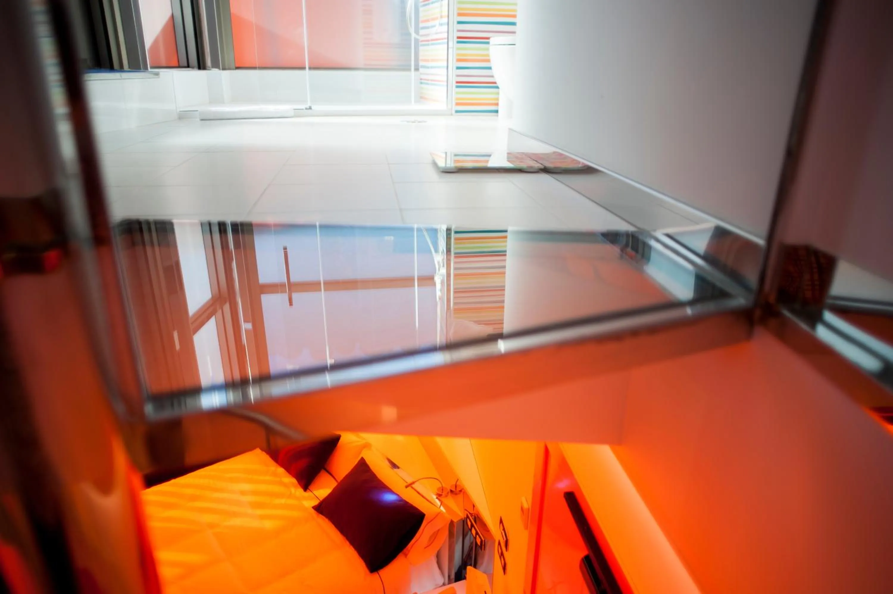 Bathroom, Bed in Resotel