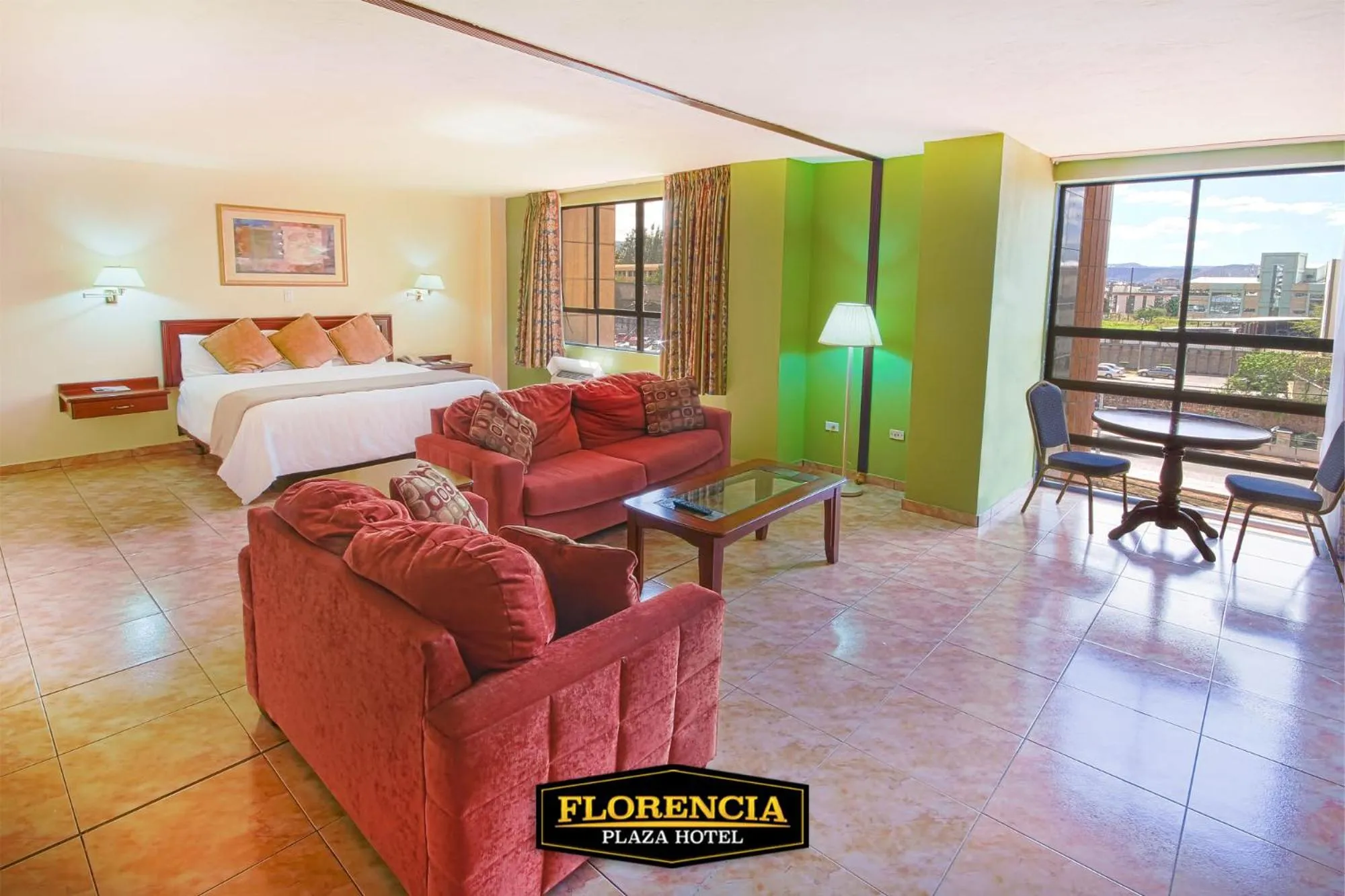 Living room, Bed in FLORENCIA PLAZA HOTEL