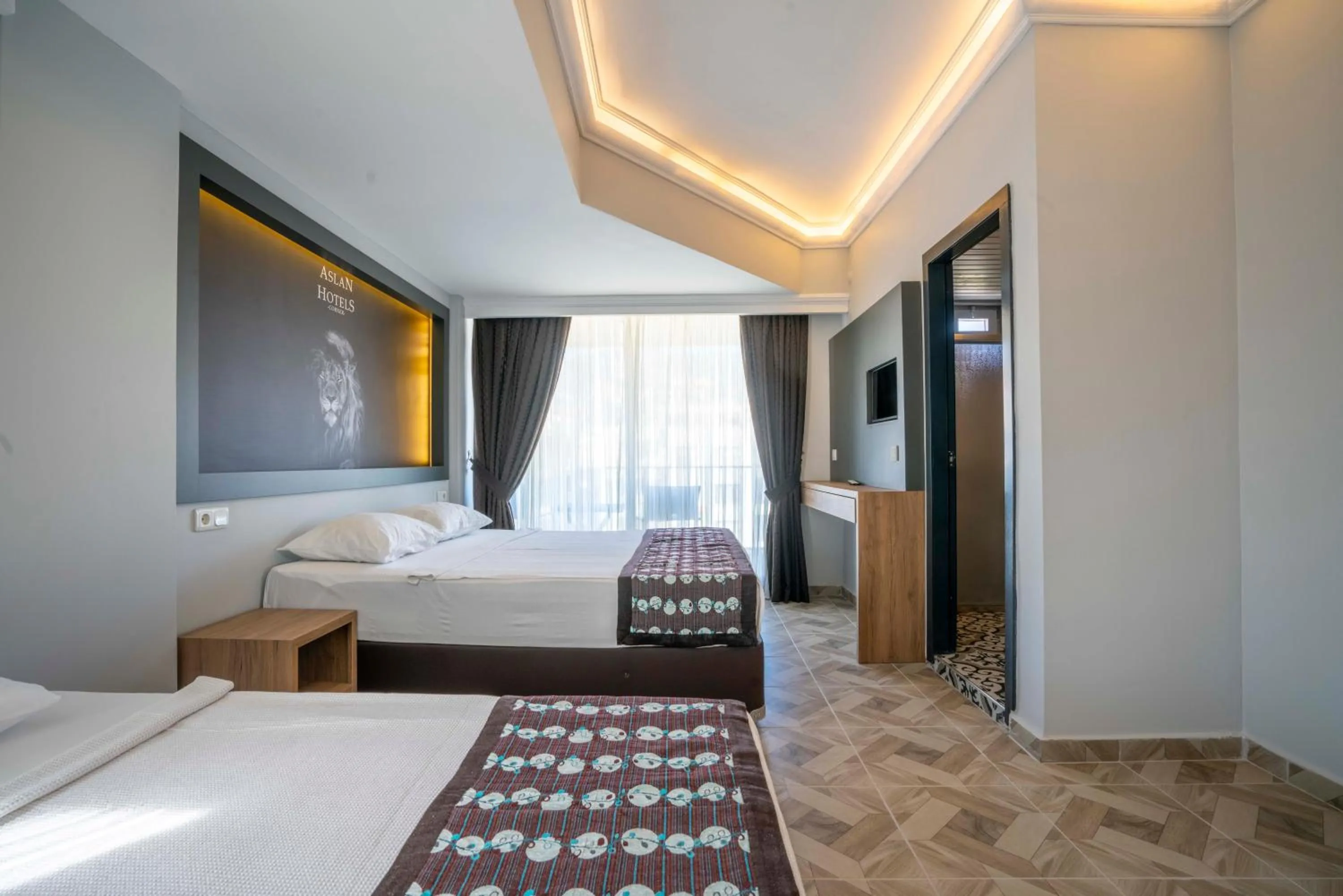 Bed in Aslan Corner Hotel