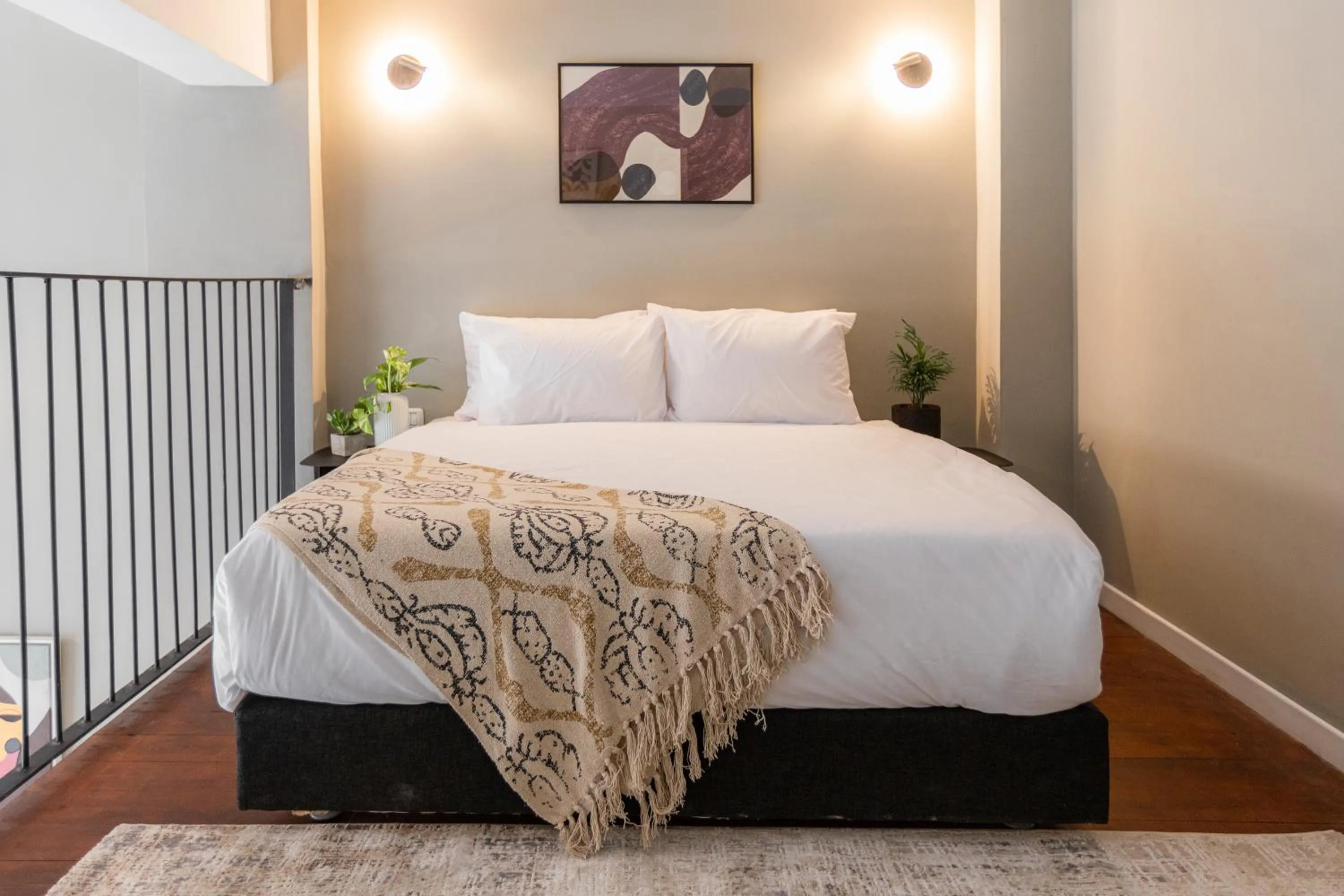 Bed in DeBlox living - Alhambra Apartments