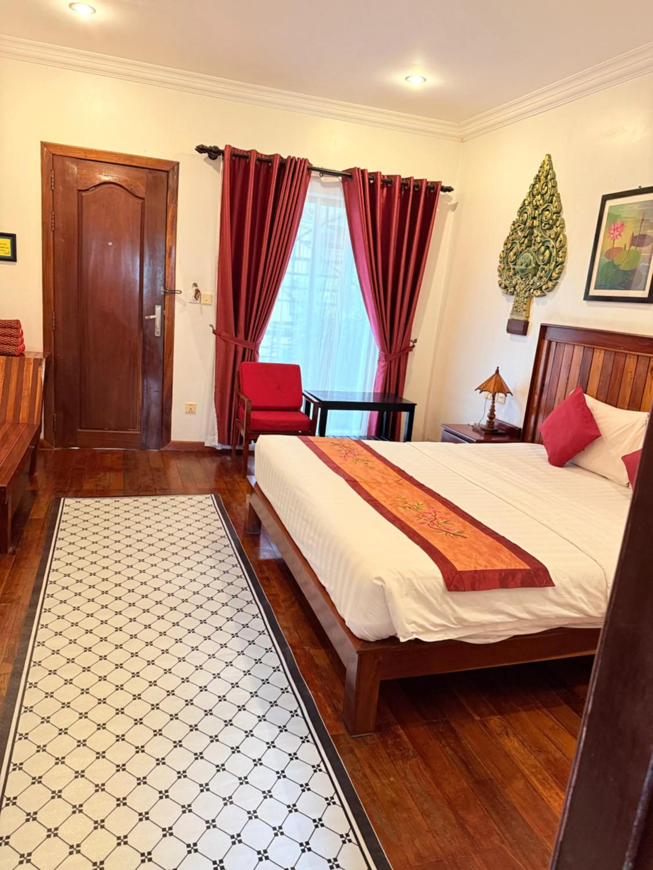 Bed in Asanak D'Angkor Boutique Hotel