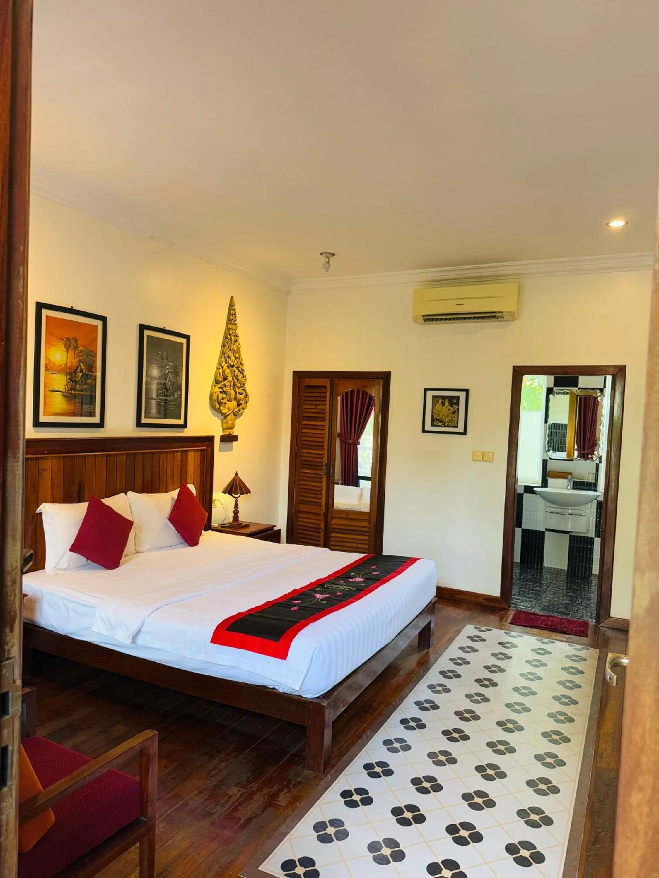 Bed in Asanak D'Angkor Boutique Hotel