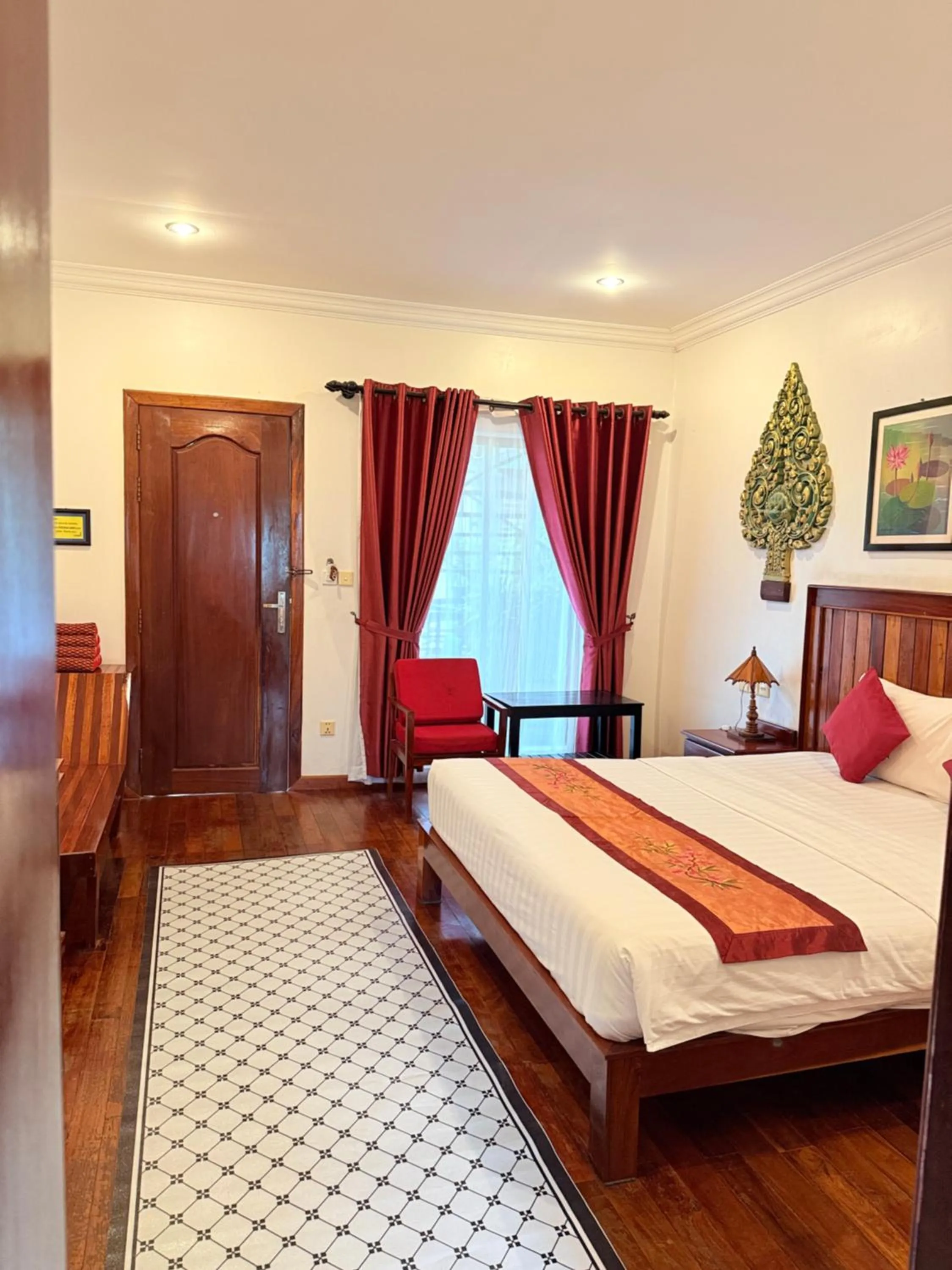 Bed in Asanak D'Angkor Boutique Hotel