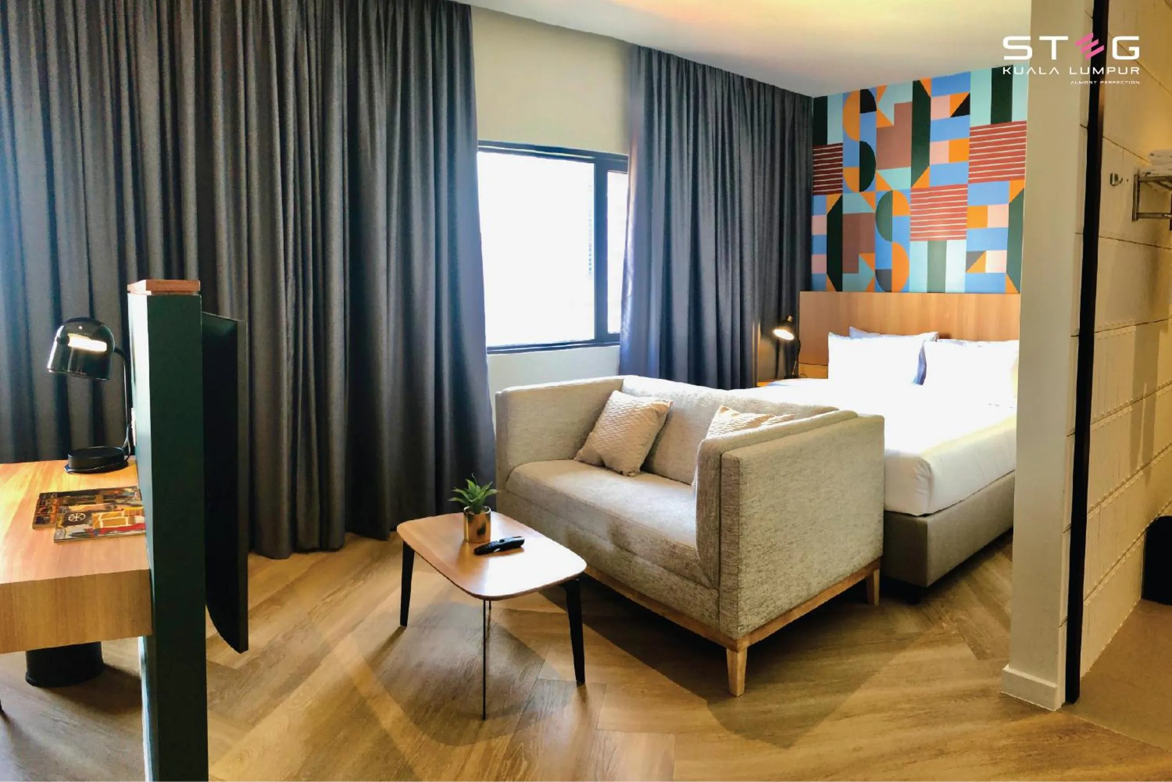 Seating area, Bed in STEG Kuala Lumpur