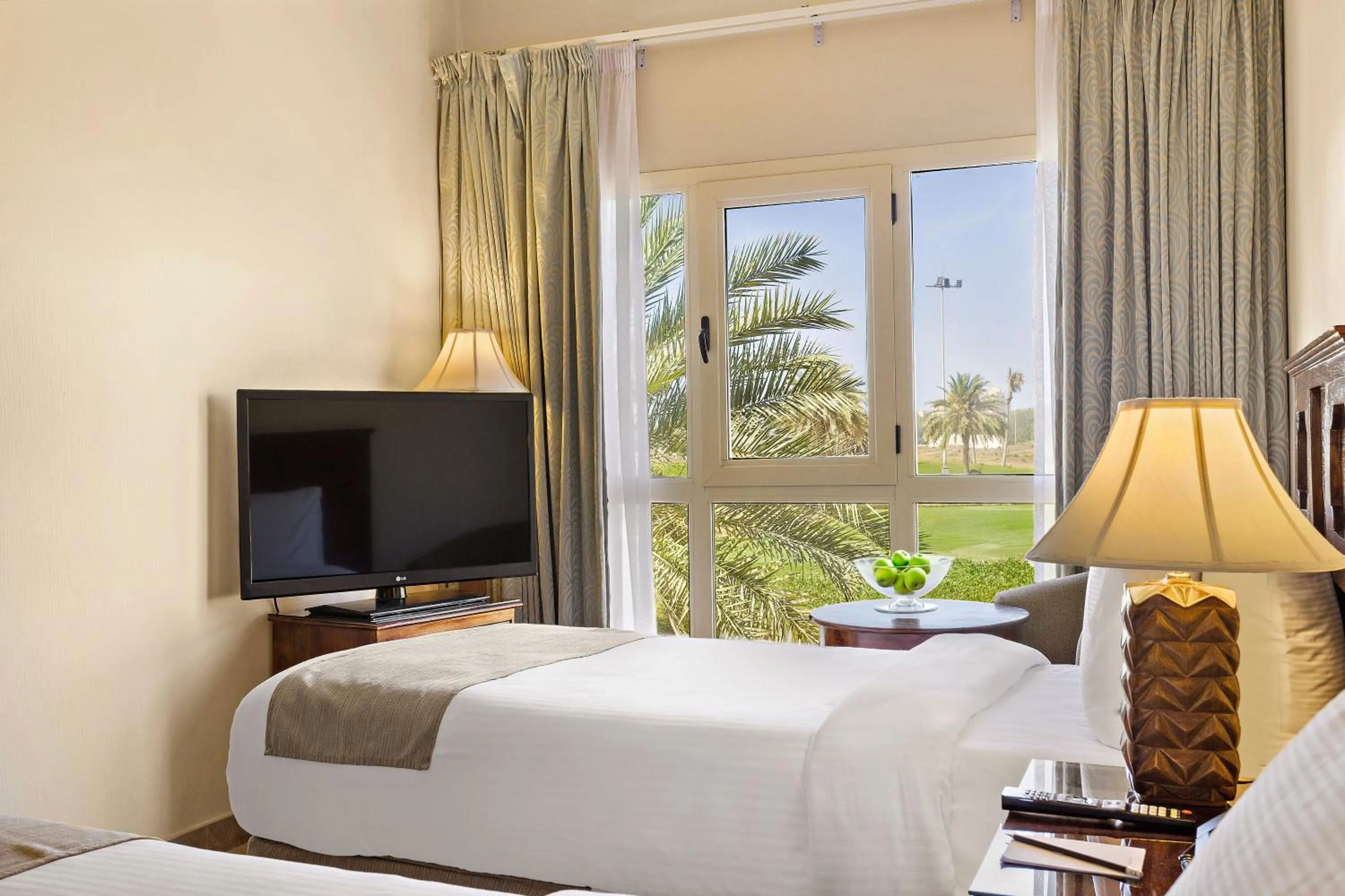View (from property/room), Bed in Al Hamra Village Hotel