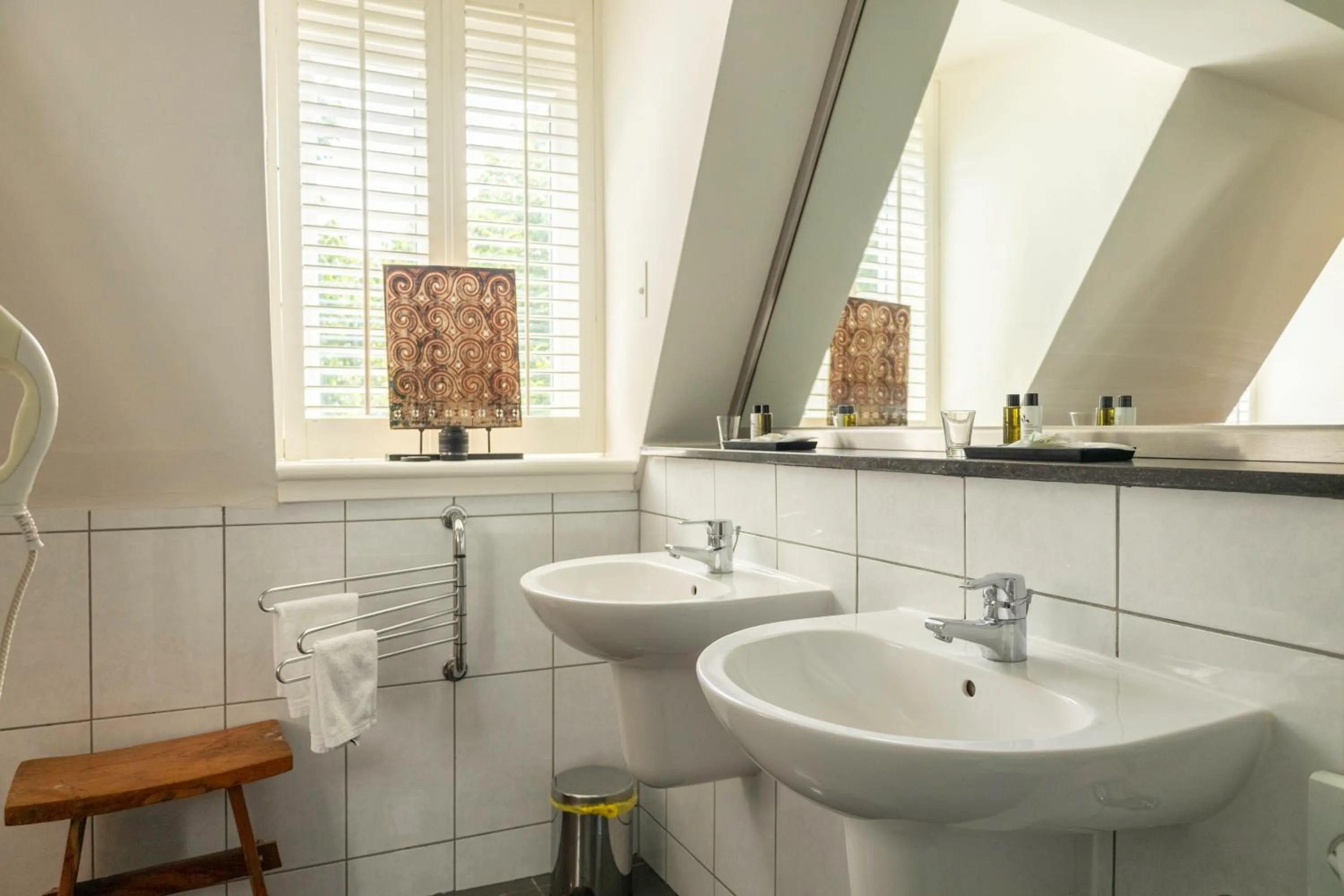 Bathroom in Bouteaque Hotel