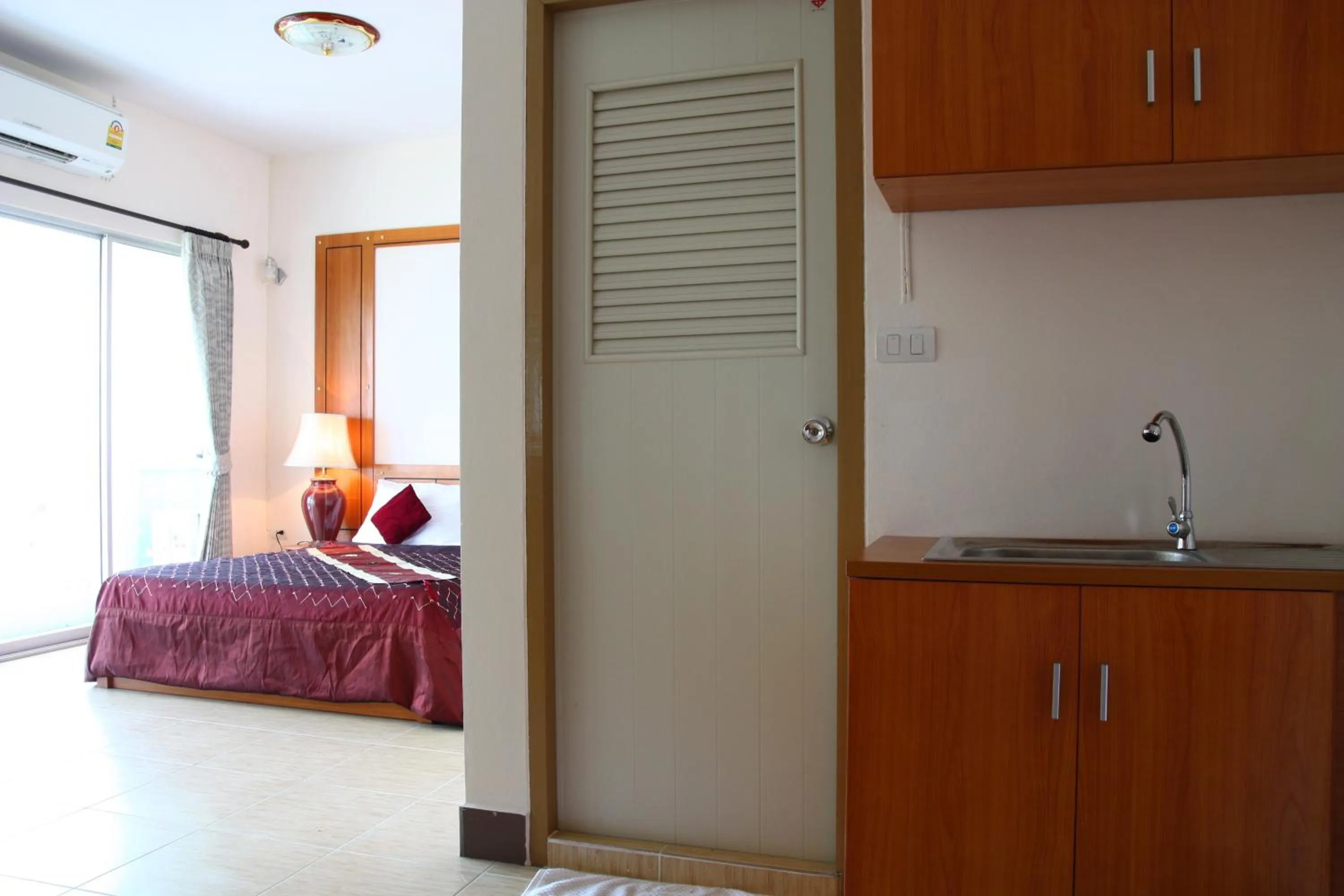 Kitchen or kitchenette, Bed in Choktawee Residence and Mansion