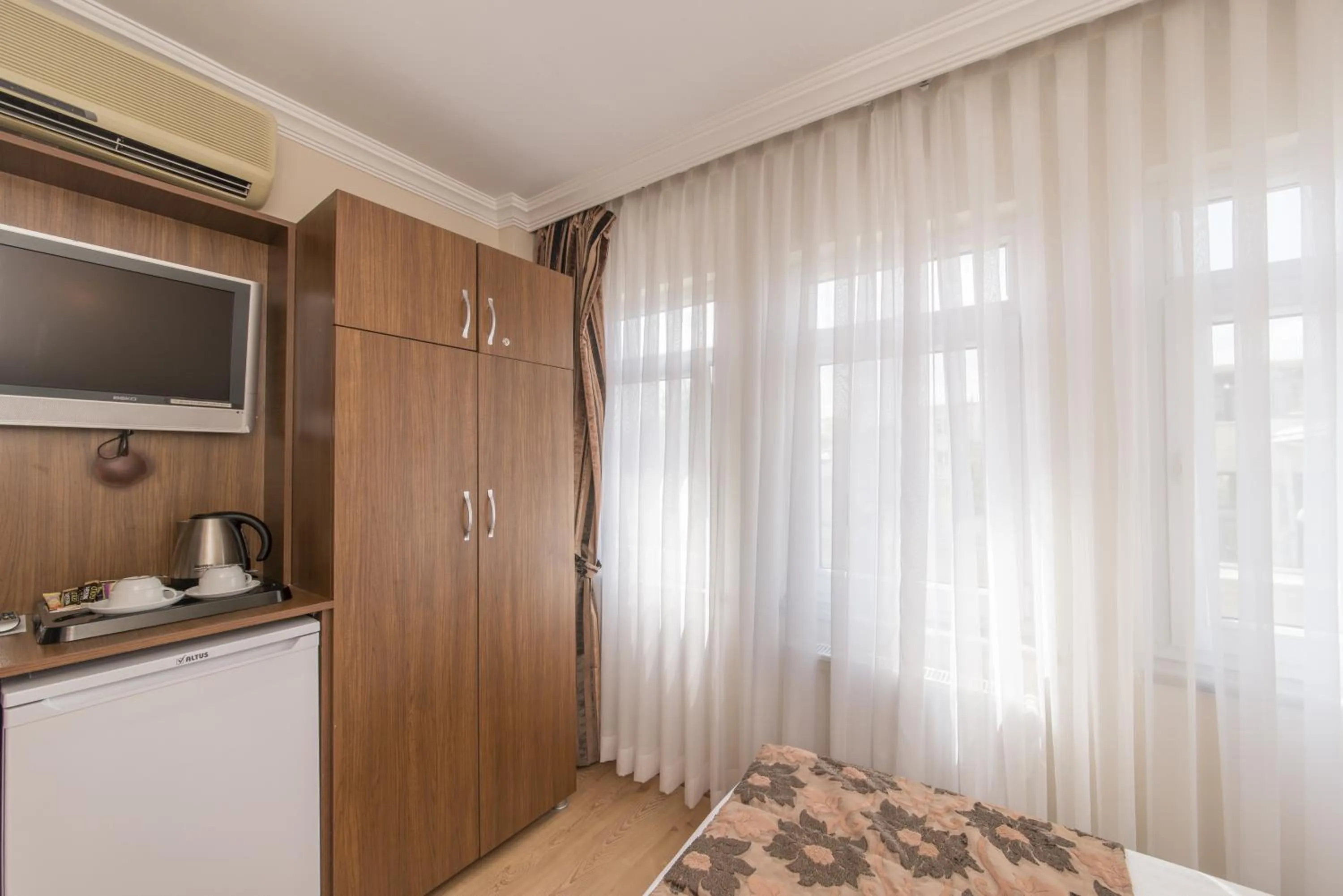 Decorative detail, TV/Entertainment Center in Sultan's Inn