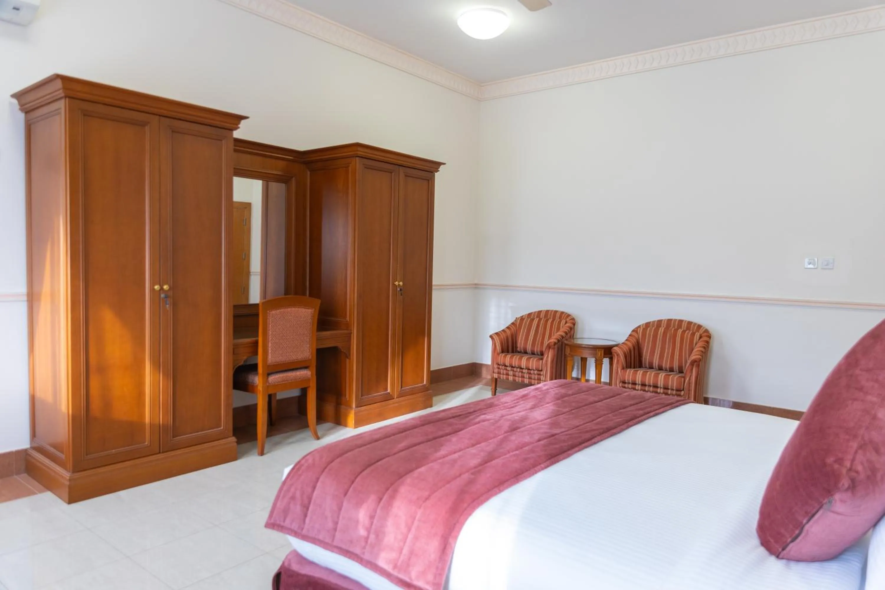 Bed in Al Shatti Villas