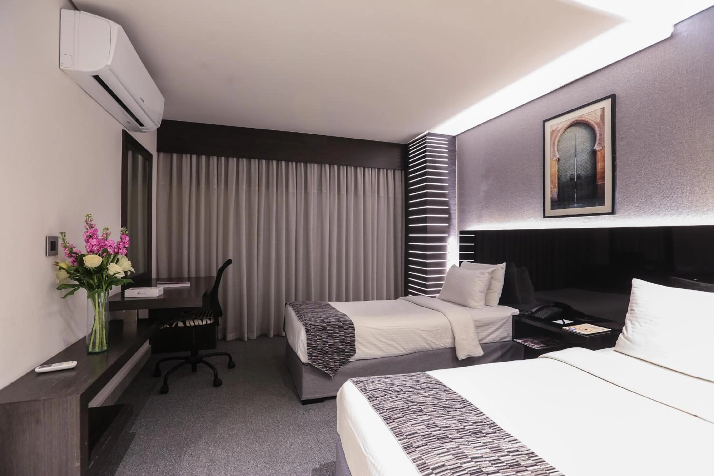 Bed in Khuttar Apartment