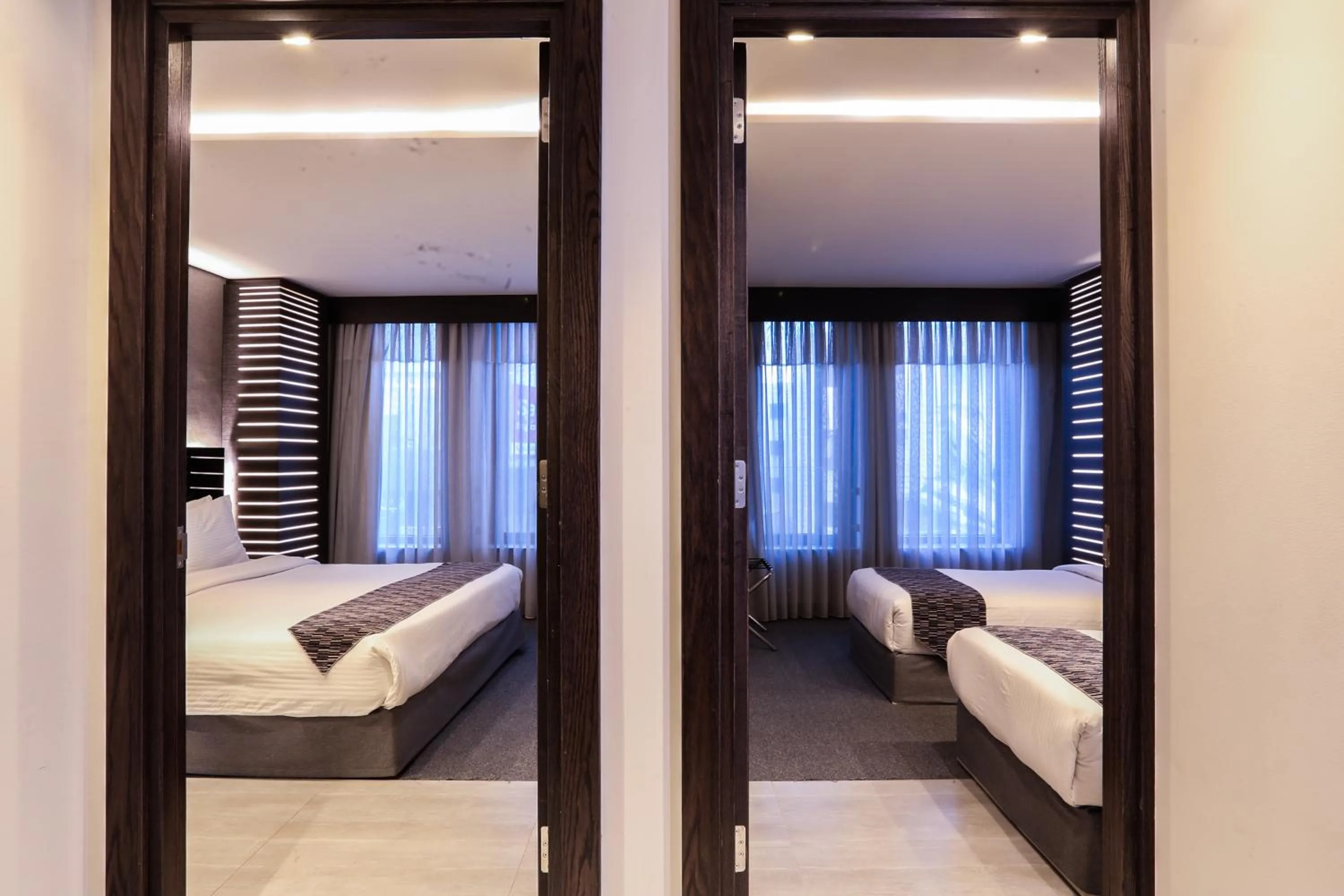 Bed in Khuttar Apartment