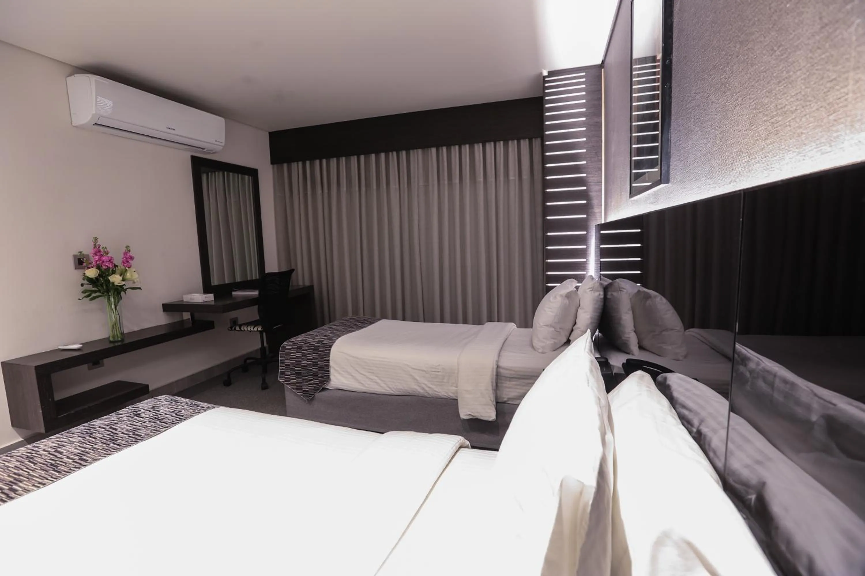 Bed in Khuttar Apartment