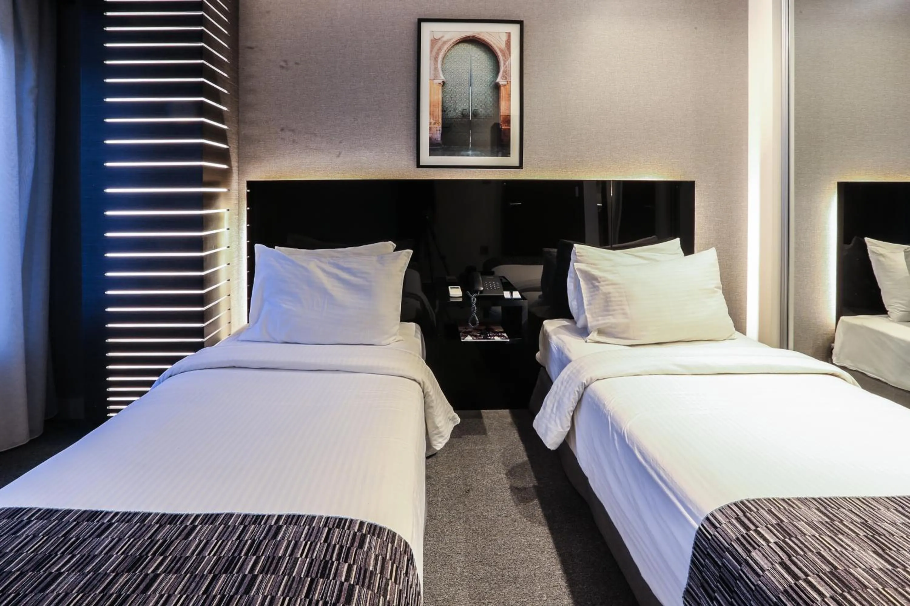 Bed in Khuttar Apartment